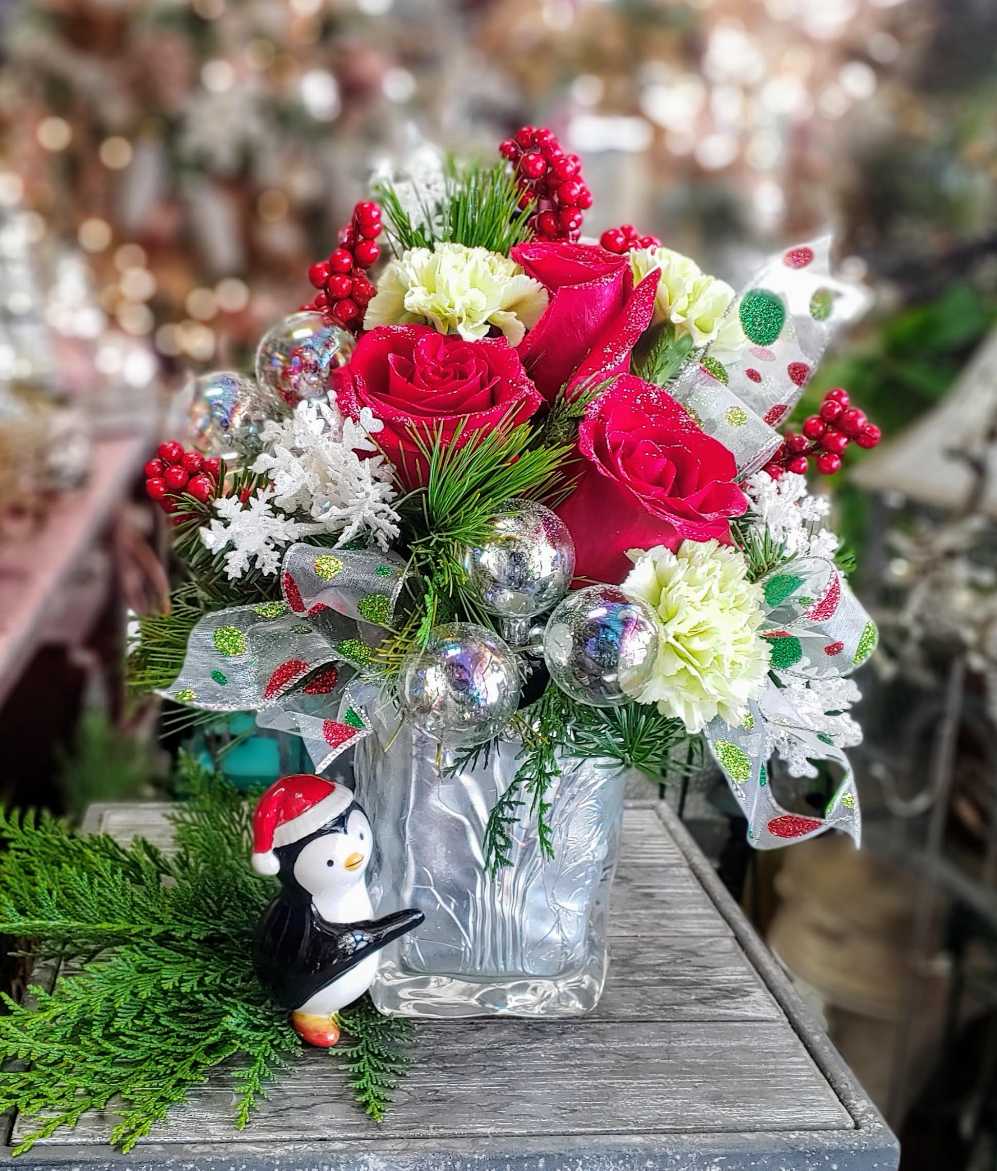 Happy Penguin - A holiday mix in a keepsake penguin container.