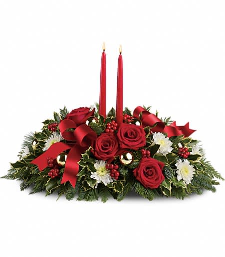 Holiday Shimmer Centerpiece - Make the season bright - and their table a delight - with the glowing tapers, radiant red roses and fresh Christmas greens of this stunning seasonal centerpiece.