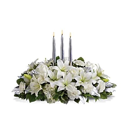 Silver Elegance Centerpiece - Blanket your holiday table in elegance with this lush white floral Christmas centerpiece. Beautiful white hydrangeas and lilies form a snow white cloud beneath three slender silver candles.