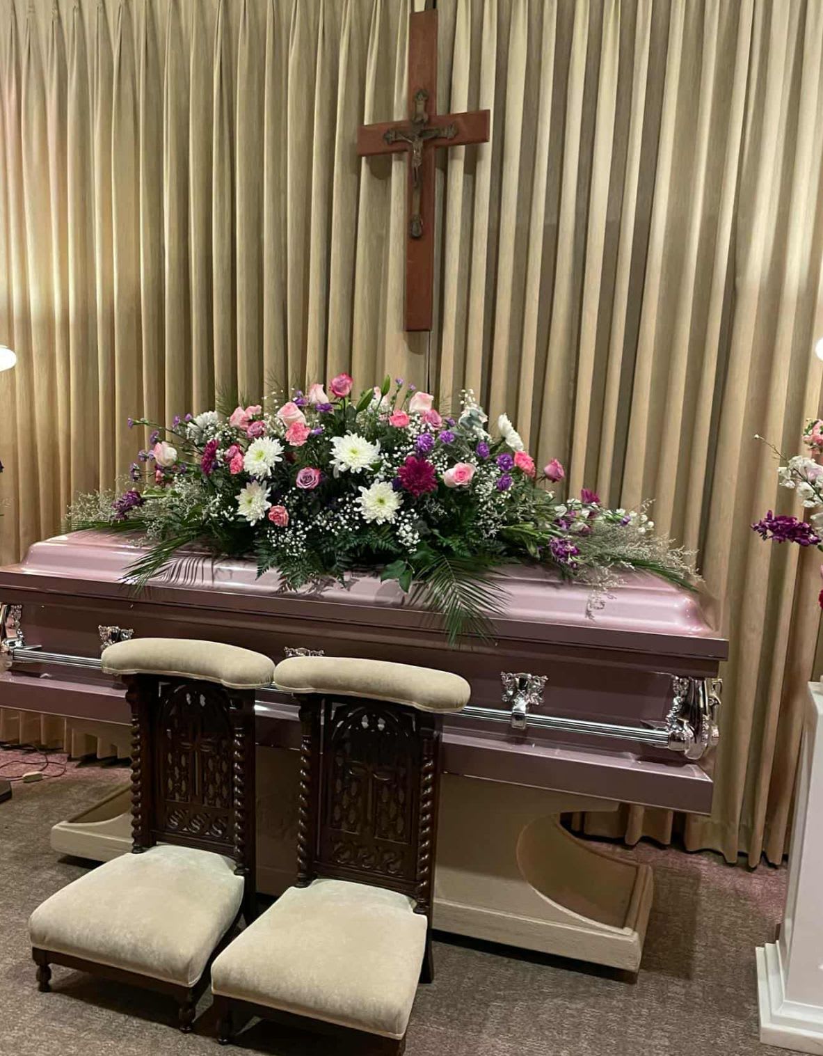 Lavender Bloom Casket - Condolences in Lavender rest on full length casket 