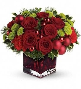 MERRY &amp; BRIGHT - You may not be able to guarantee a white Christmas, but with elegant touches like stunning red roses mixed with ornament balls and douglas fir, you can be assured of sending a merry and bright one! 