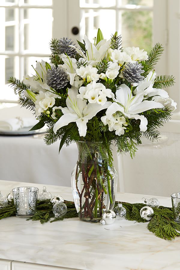 White Winter Bouquet - This gorgeous winter bouquet is perfect for any occasion!  Deluxe is pictured
