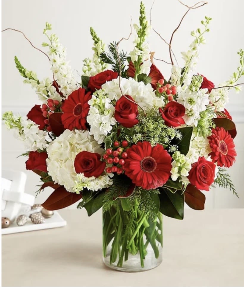 Red and white - The mix of colors,its red tone iluminates this time ,accompanied by white and touch of green that reflect this season