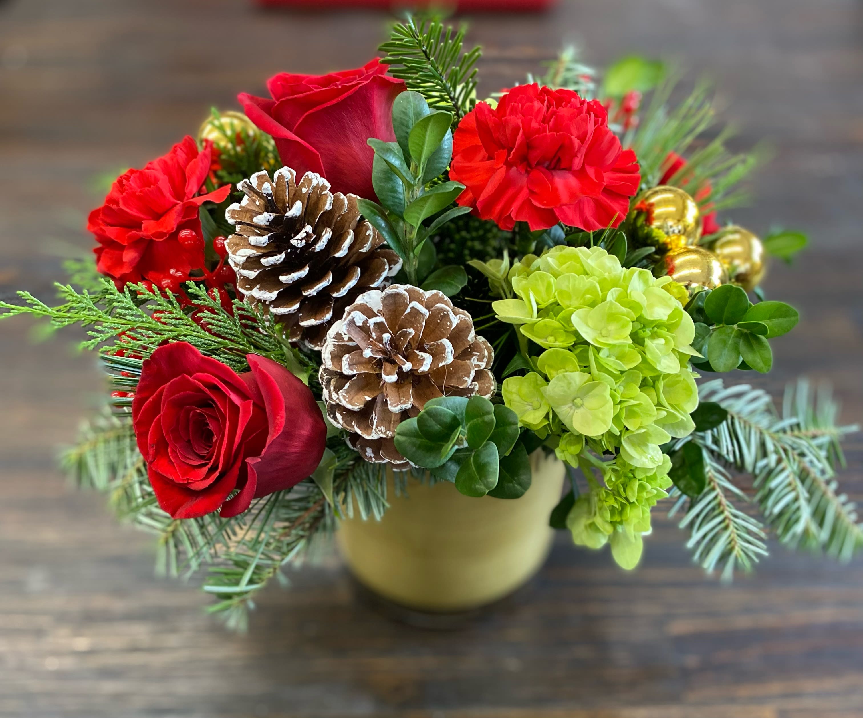 Red &amp; Gold - A Christmas beauty of fresh holiday greens with Christmas red flowers sprinkle with golden accents.