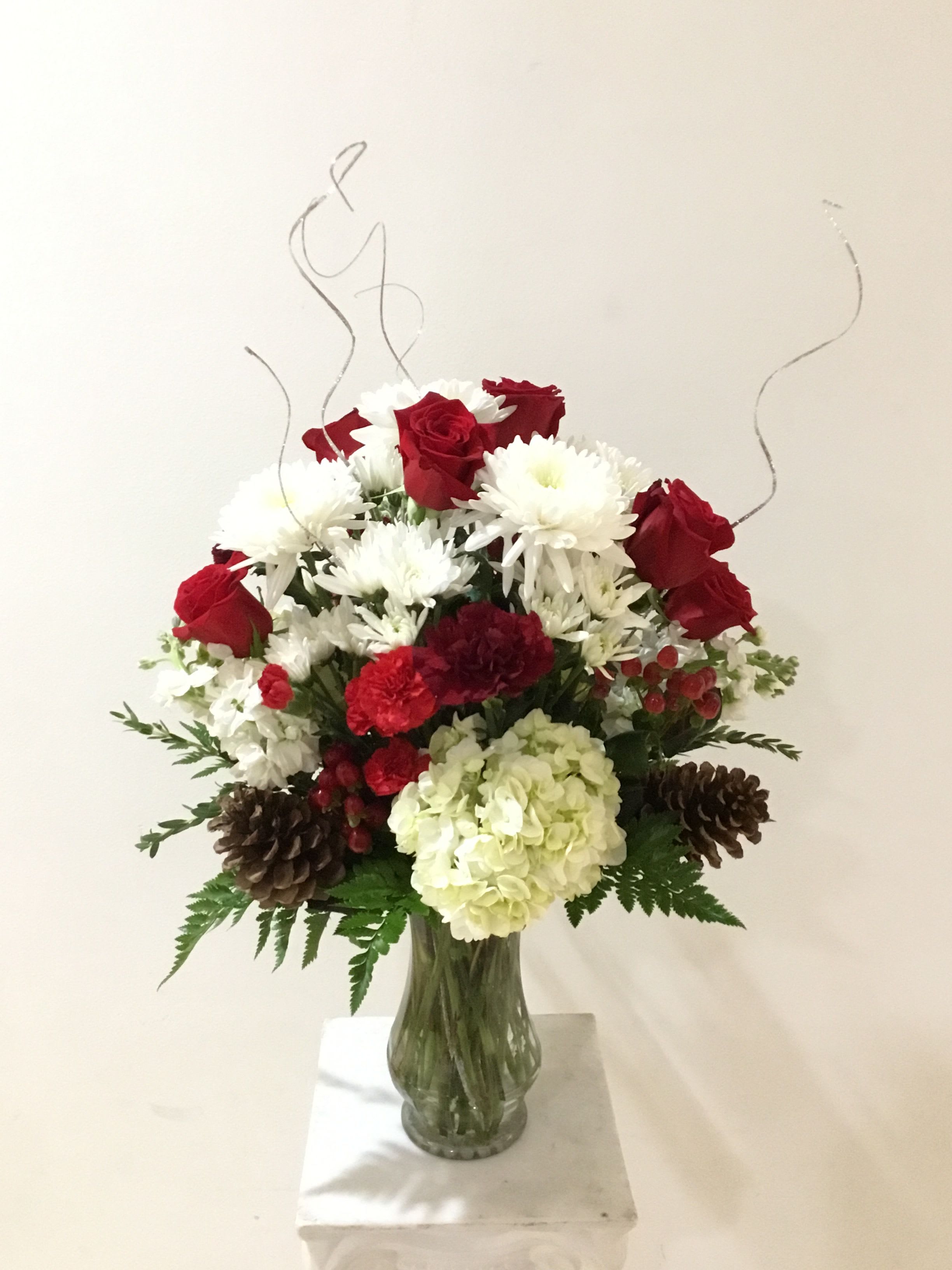 Winterbloom Bouquet - Beautiful assortment of fresh blooms, beautifully designed with a holiday flair.  