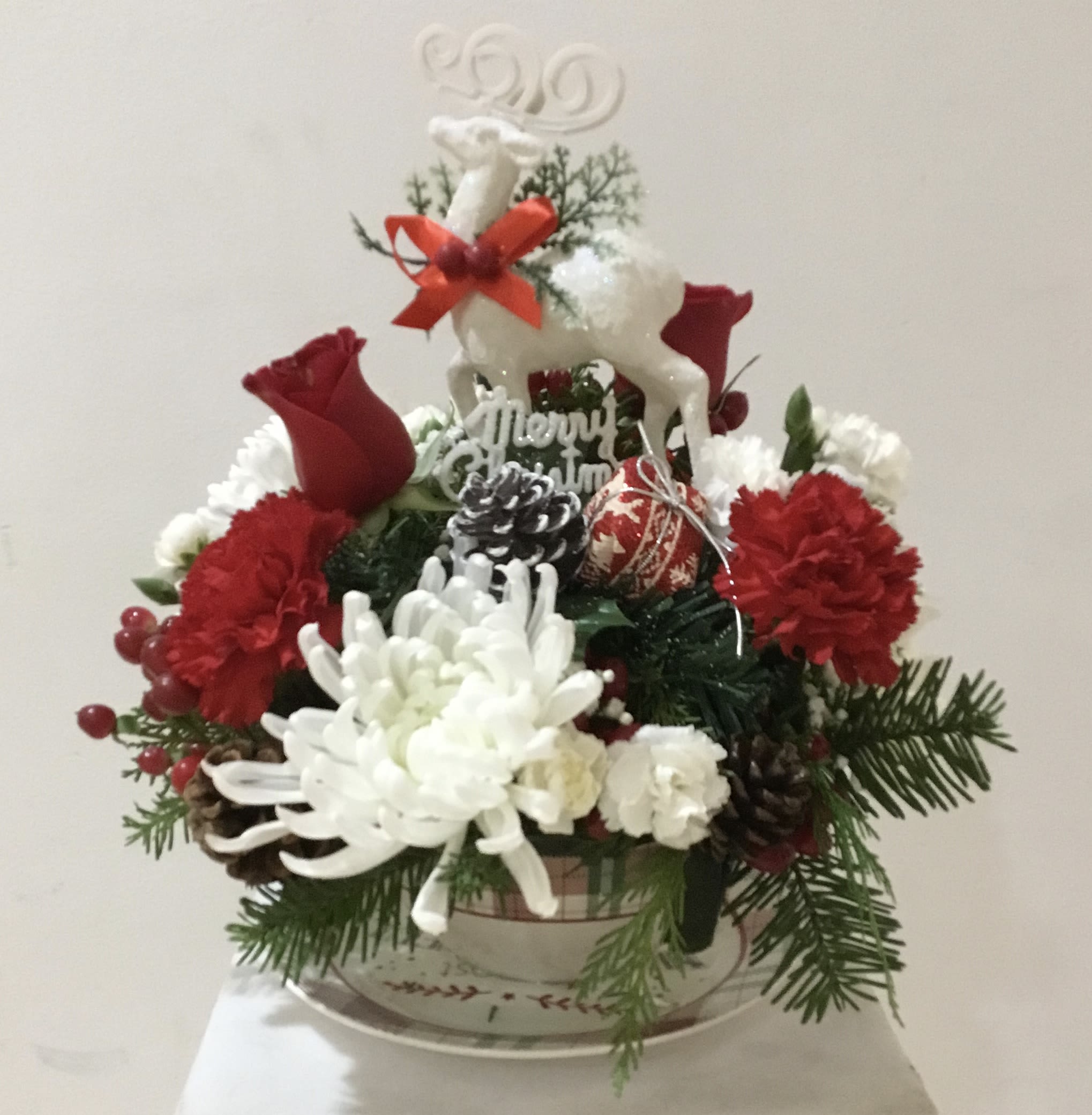 Holiday Bowl - Beautiful assortment of fresh blooms, beautifully designed in a holiday themed bowl and saucer.