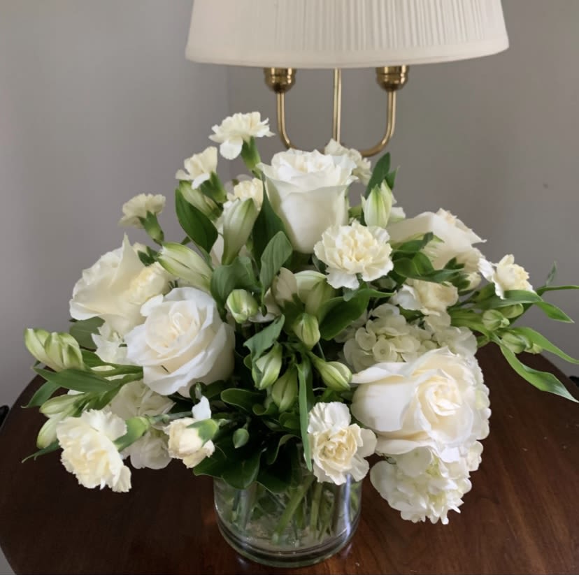 Loving Memories Arrangement - Our Loving Memories Arrangement is a heartfelt design crafted to be a lasting tribute to your loved ones. Honor their memory with this beautiful arrangement that speaks volumes of love and remembrance. 