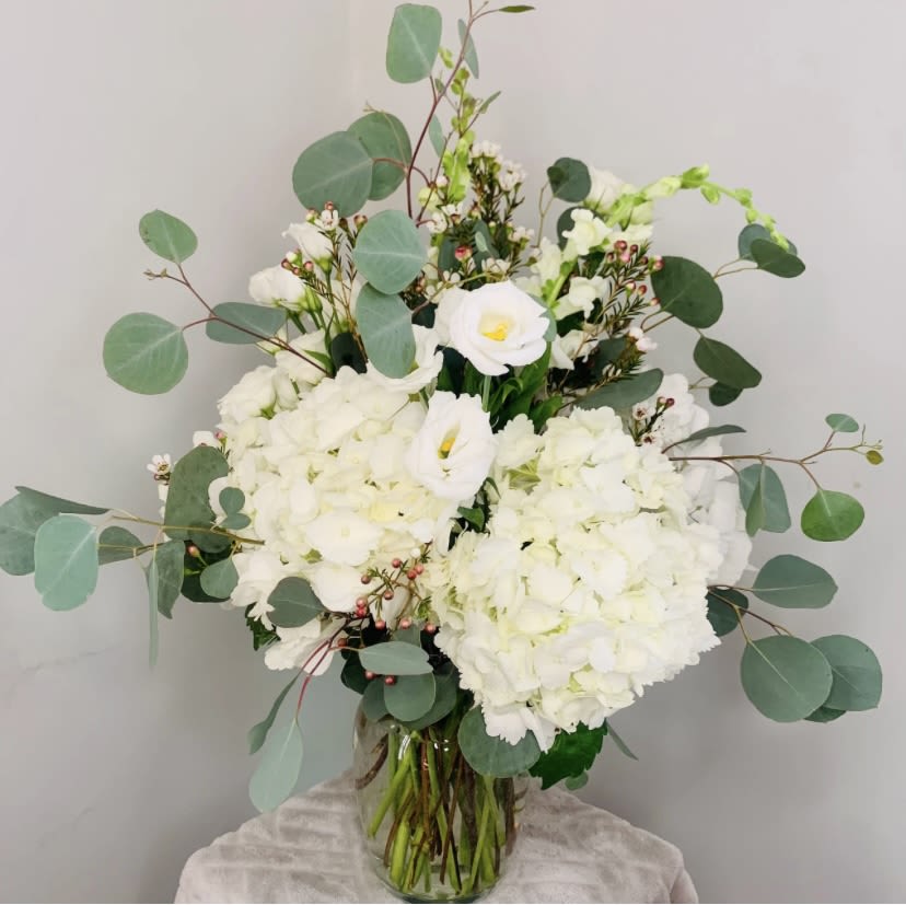 Peaceful Arrangement. - Express your heartfelt condolences with the Peaceful Arrangement that conveys your deepest sympathies and offers comfort in times of need. 