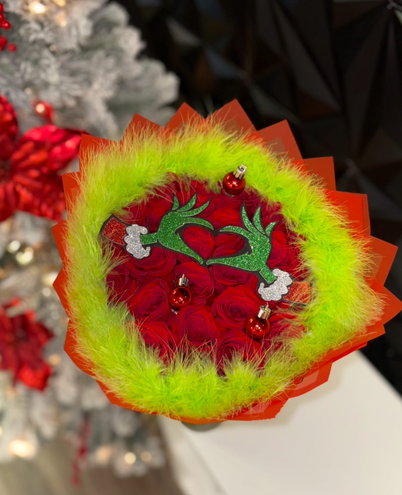XMAS Grinch - Grinch inspired bouquet . Perfect for the Holidays  25 Count bouquet . With Christmas decorations 