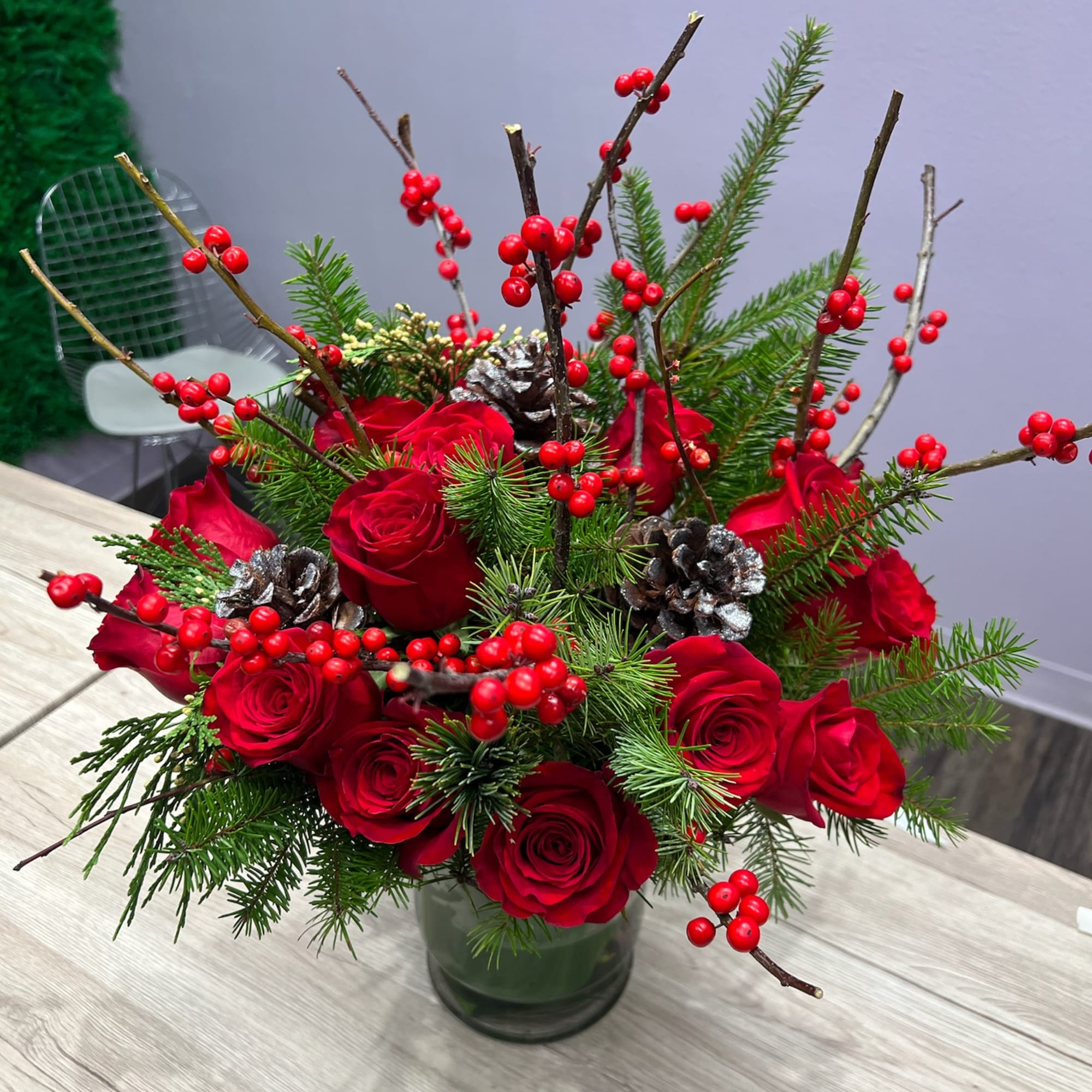 Holiday Magic - Red roses, Christmas Branches, Berries in a vase (included)