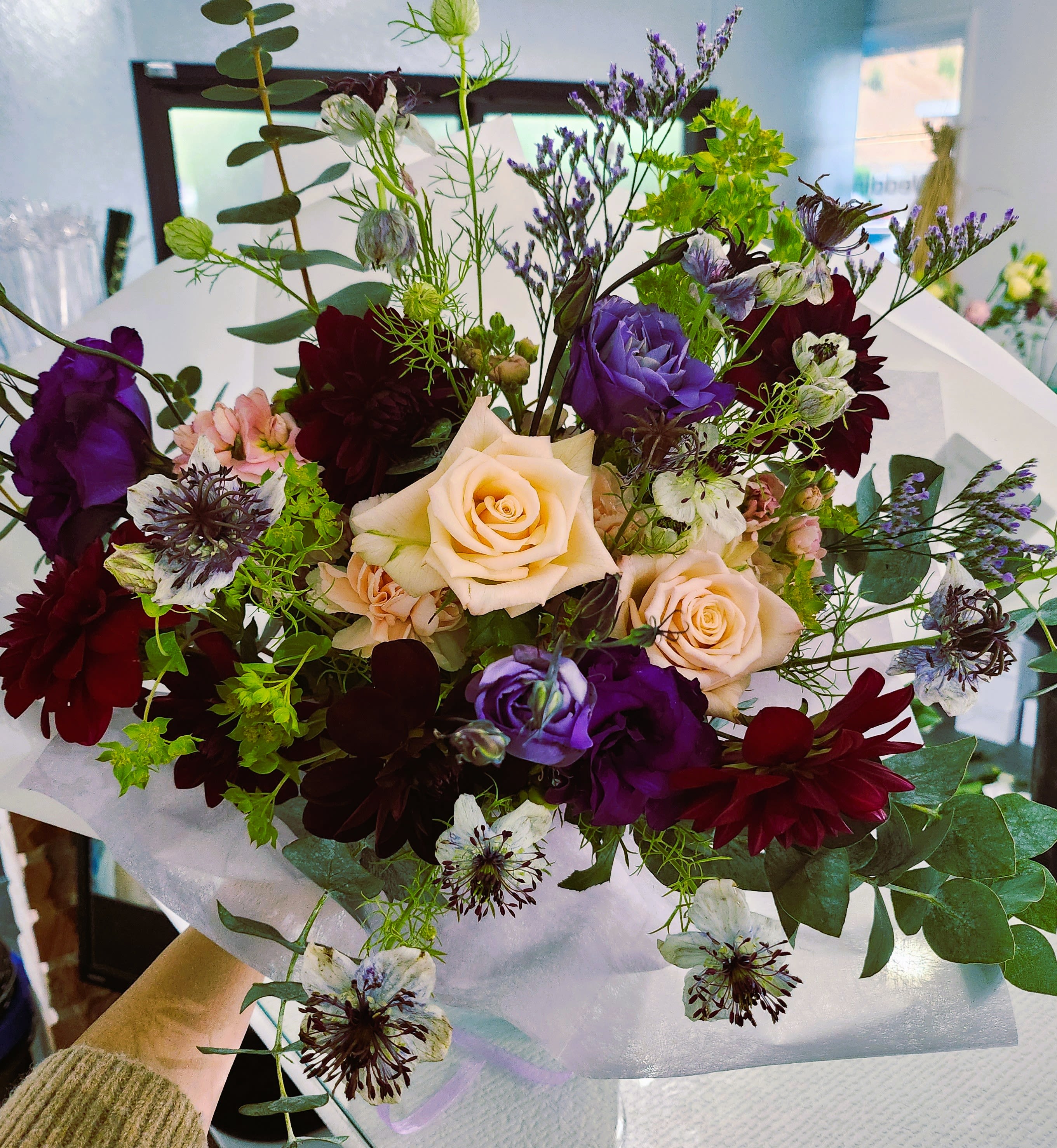 Intense Love - The inspired by the deep, moody, but still romantic color pallet of this premium bouquet. The perfect combination of modern when it comes to a romance Hand Bouquet. 