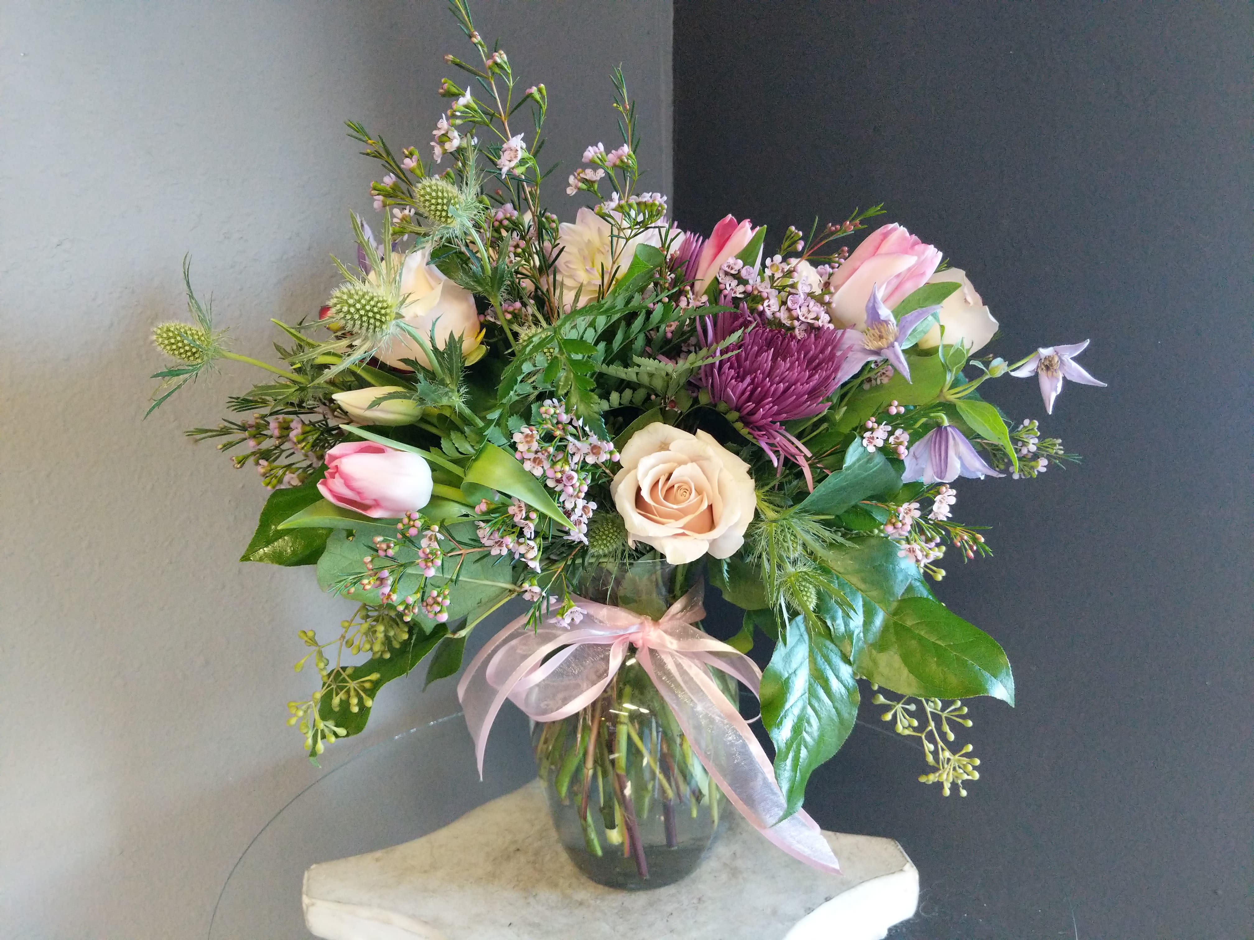 # 130 Winter Floral Arrangement - A beautifully selected bunch of the freshest flowers in a vase uniquely arranged by hand.
