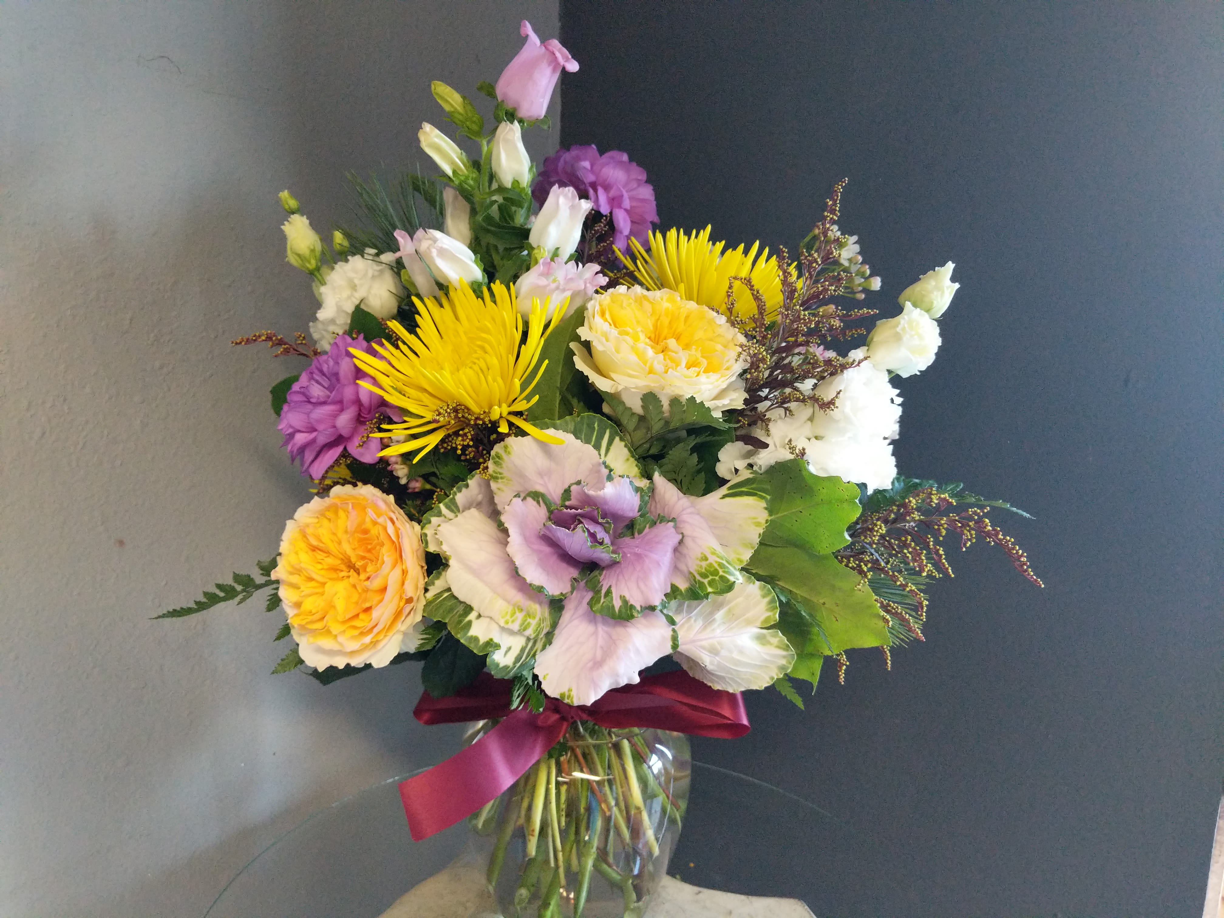 #145 Winter Floral Arrangement  - A beautiful one-of-a-kind arrangement made with fresh seasonal flowers. 
