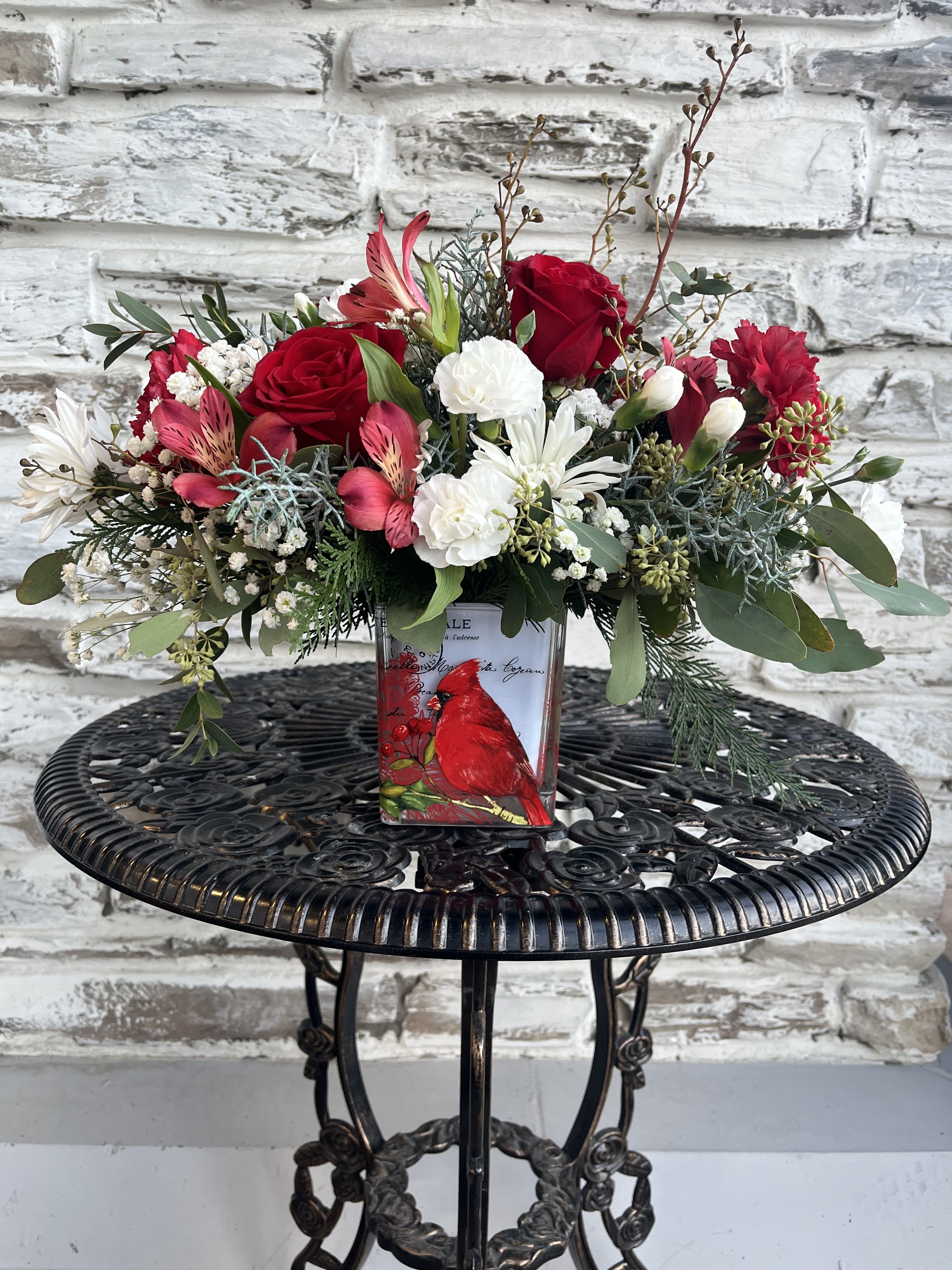 Cheery Cardinal - Paint a magical holiday scene with this classic Christmas arrangement! Beautifully displayed in a vintage-inspired glass keepsake container adorned with a cheerful cardinal.