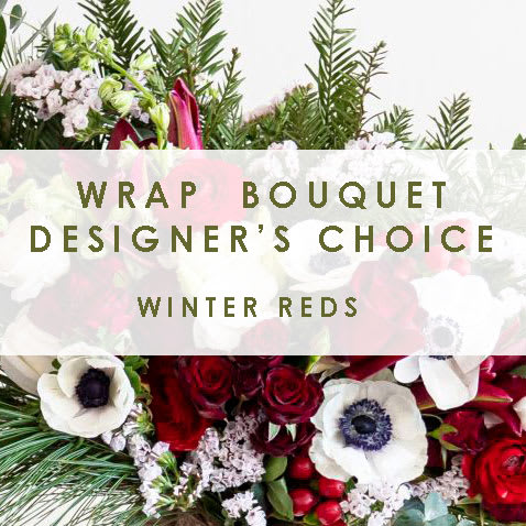 DESIGNER'S CHOICE WRAP - Winter Red - We will hand select a tasteful mix of fresh winter green, and reds, whites, and green flowers for a beautiful wrapped bouquet for your recipient. A festive holiday wrap in deed.