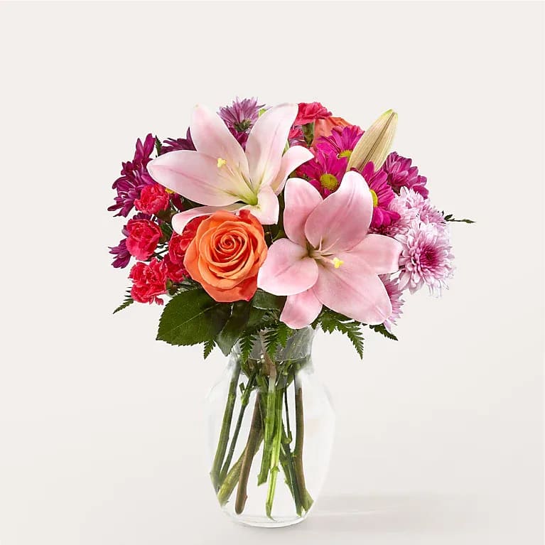 Light of My Life - Illuminate your loved one's day with the Light of My Life Bouquet. This enchanting arrangement features standout stems like lilies and roses to capture their eyes and their heart.