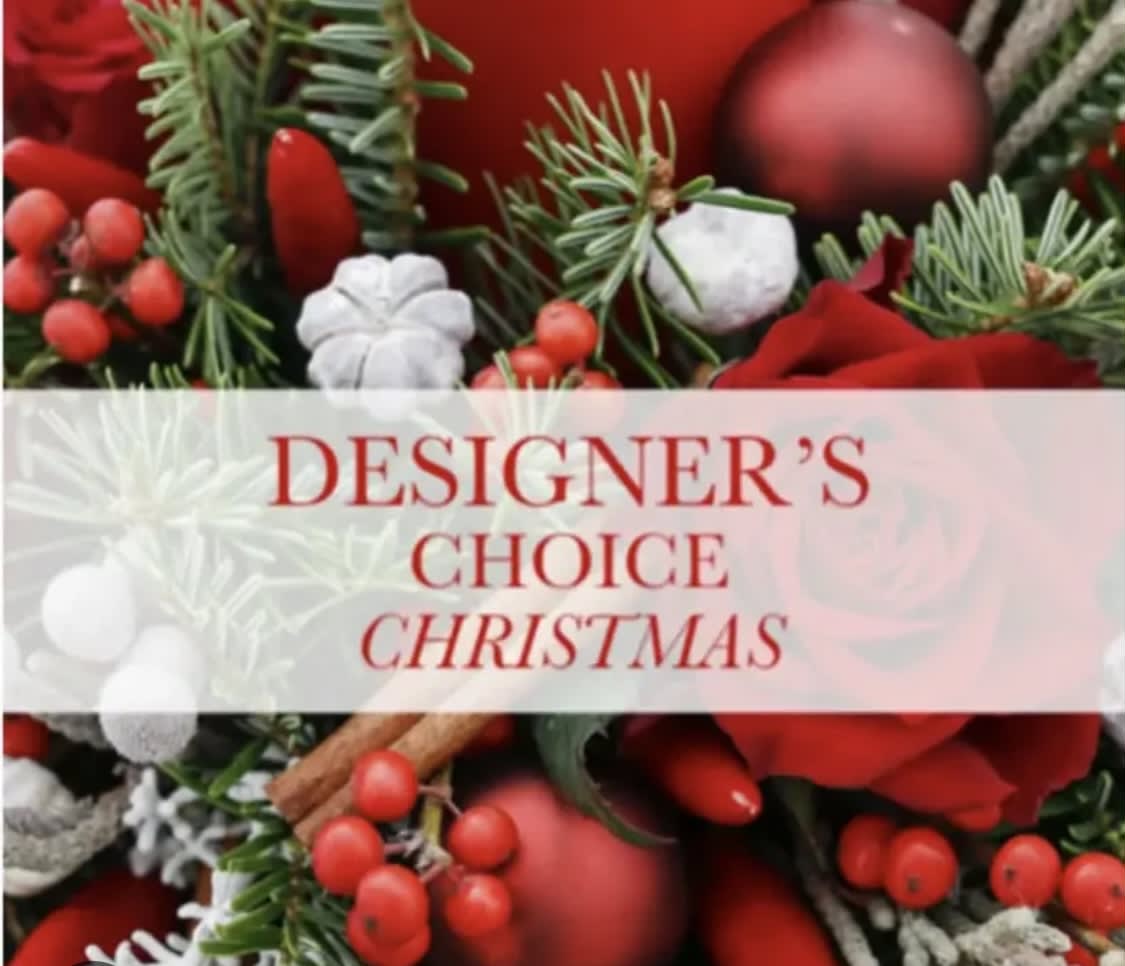 Designers choice Christmas arrangements  - This is where we allow our talented designers to create a Christmas arrangement that is different from what you see on our website. This gives them the opportunity to create some different and unique.