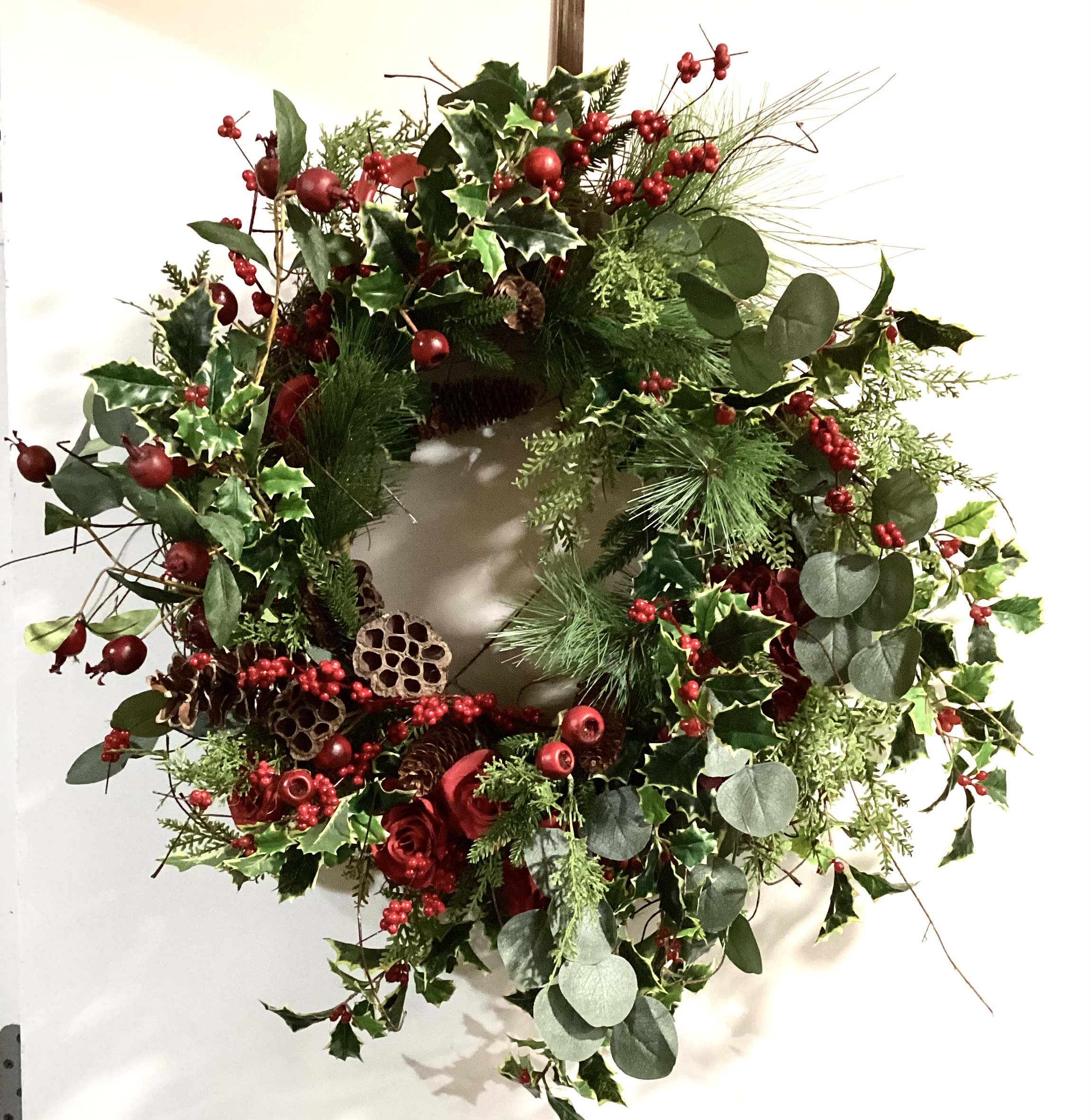 Permanent Holly and cranberry holiday wreath - Rich evergreens with glossy holly leaves and vibrant red berries gives a joyful holiday look, perfect for any front door. 