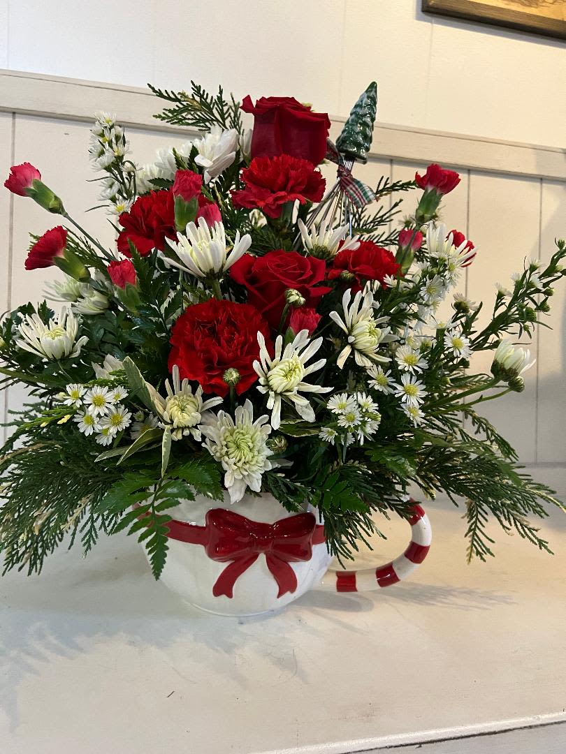 Mixing up Christmas - LARGE MIXING BOWL, WITH A WISK. FILLED WITH RED CARNATIONS, CUSHIONS, ROSES, AND FILLER. THIS IS A GREAT KEEPSAKE FOR THE MOM WHO LOVES TO COOK.