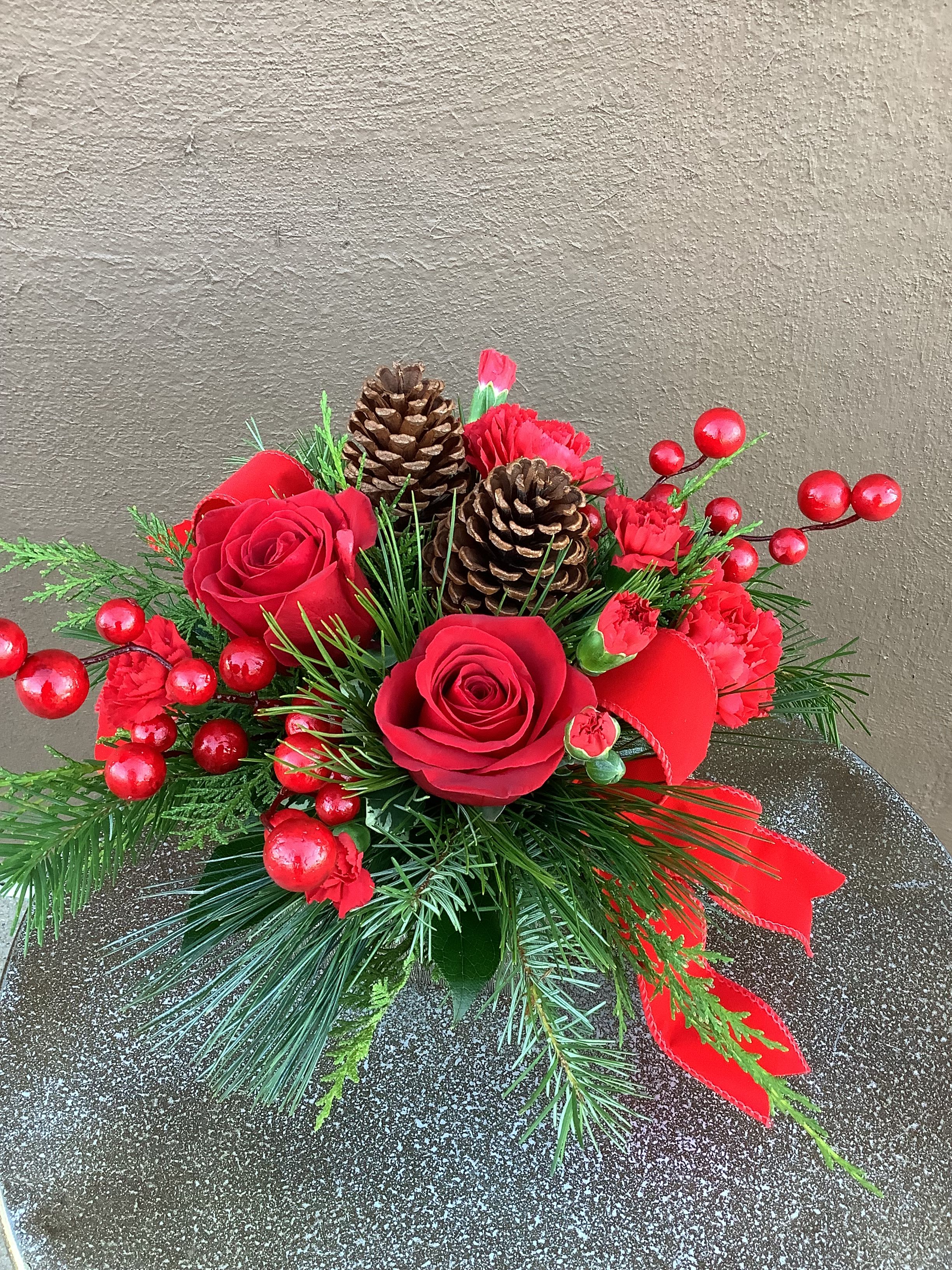Holly Jolly Christmas  - This beautiful, traditional Christmas arrangement with beautiful red roses that would set anywhere . A perfect Christmas greeting! 