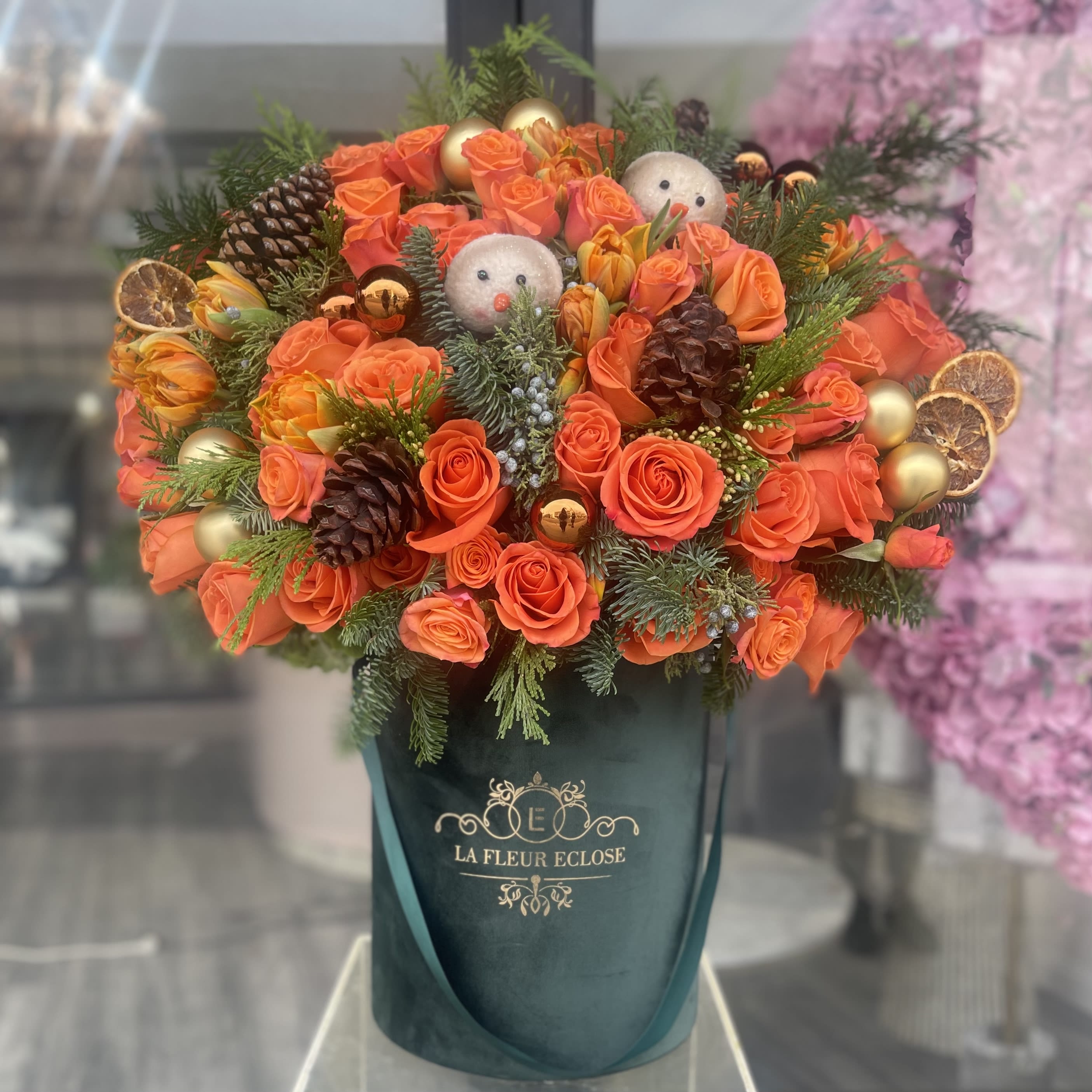 Christmas melody ho-ho - Mix of flowers in Christmas thematic in our green velvet signature box