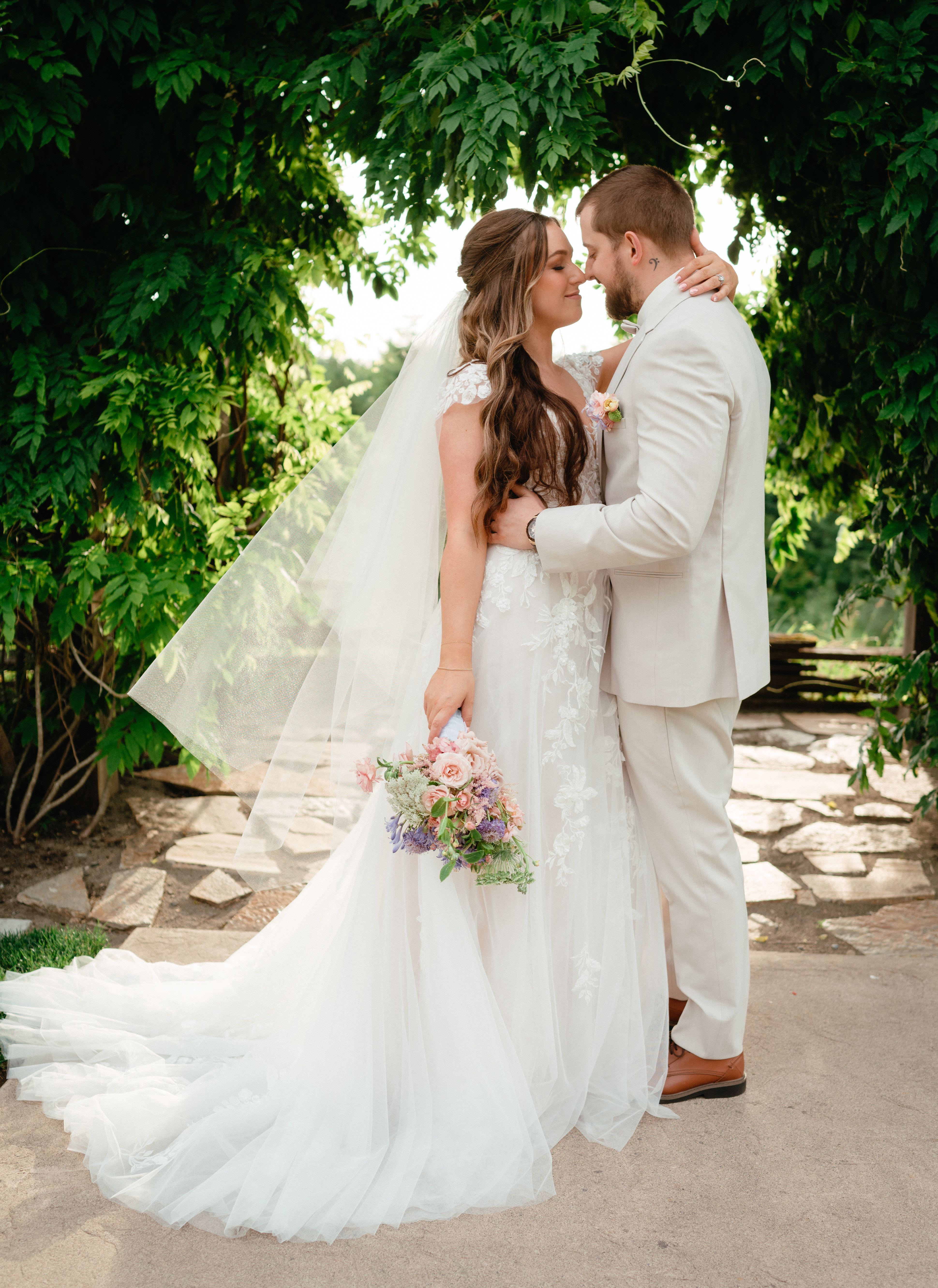 Ever After Collection - Customize your colors: When placing your order, add your preferred colors in the “Special Instructions” box. Once we receive your order, we will contact you to confirm your color choices and discuss the flowers we will be using for your bridal bouquet, boutonnieres, ceremony arrangements, reception centerpieces, and cake decorations.    If you would like to contact us before purchasing the order, please call us at 360-688-6608  This package includes:  Handcrafted bridal bouquet Groom’s boutonniere 4 bridesmaids’ bouquets 4 groomsmen boutonnieres 1 Flower girl crown or petals  Ceremony flowers for the arbor or altar 8 reception centerpieces Cake flowers  Setup fee included  Additional bouquets, boutonnieres, or centerpieces can be added to fit your wedding party and venue size. For smaller wedding parties, flowers can be thoughtfully incorporated into your ceremony and reception designs to create a cohesive, full look.  Setup is included; delivery cost depends on the distance from our shop.