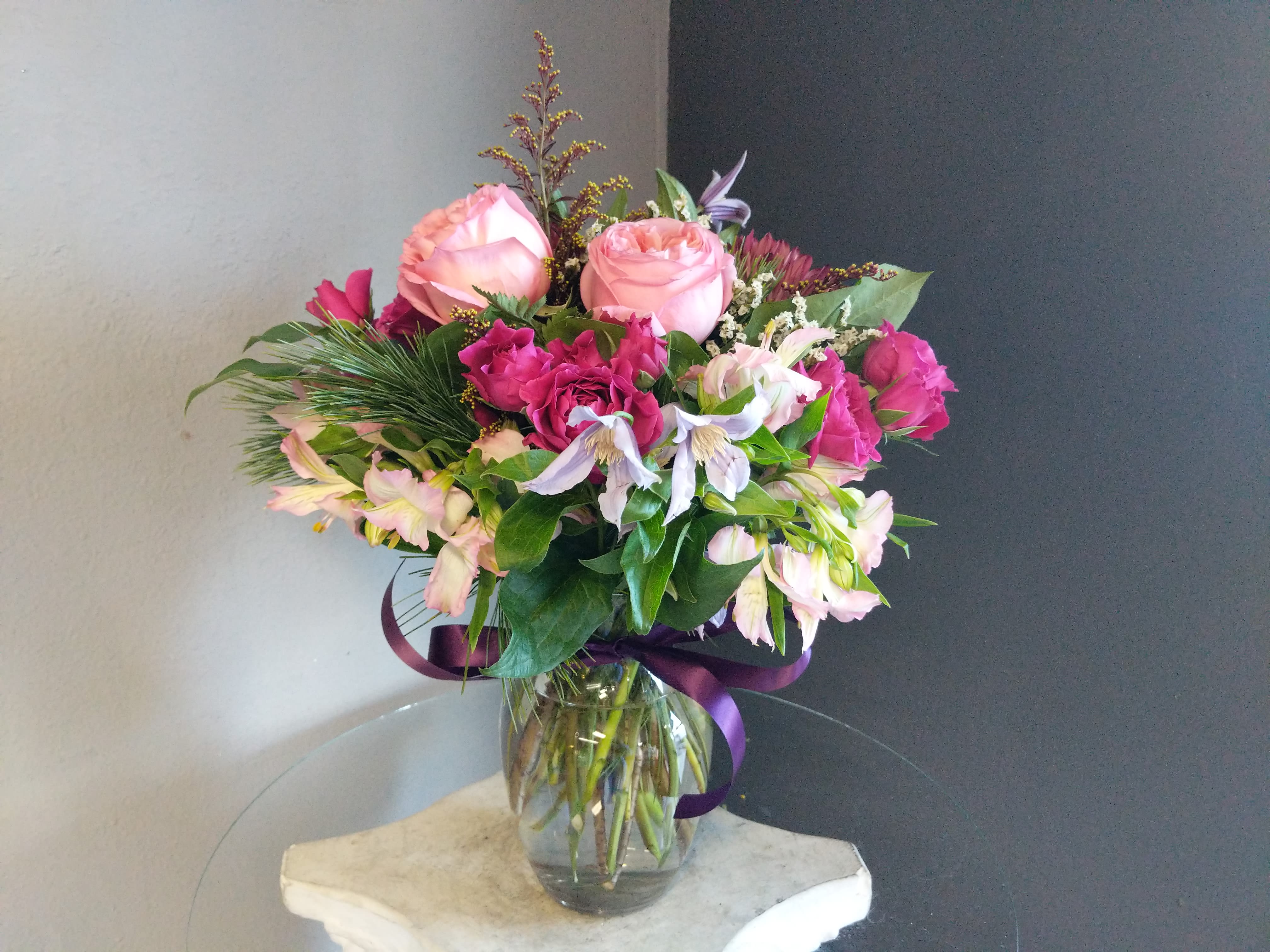 # 129 Winter Floral Arrangement - A beautifully selected bunch of the freshest flowers in a vase uniquely arranged by hand.