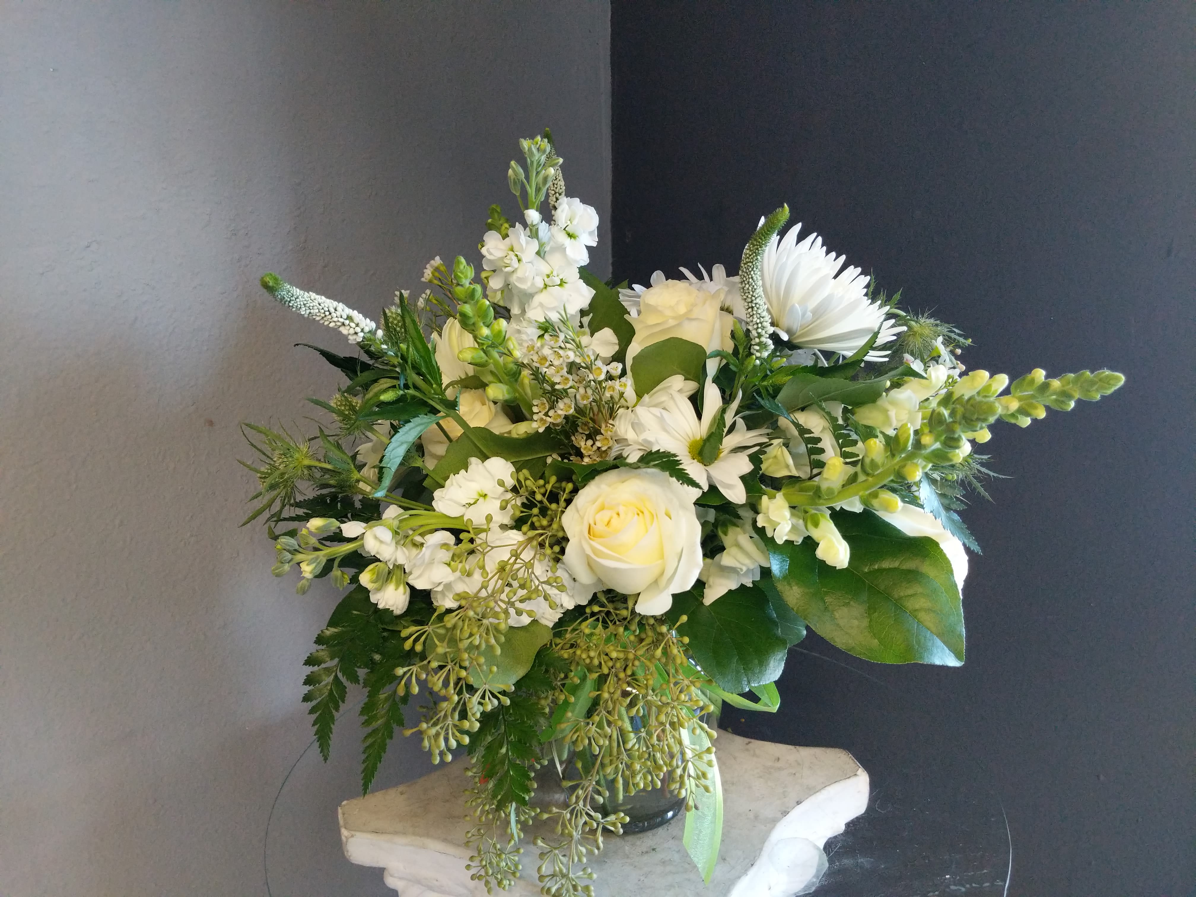 # 131 Winter Floral Arrangement - A beautifully selected bunch of the freshest flowers in a vase uniquely arranged by hand. 