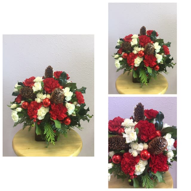 Jolly by Forever Flowers - Send love and cheer to the people you love this holiday season with this beautiful red, white and green arrangement! Perfect for any holiday occasion.