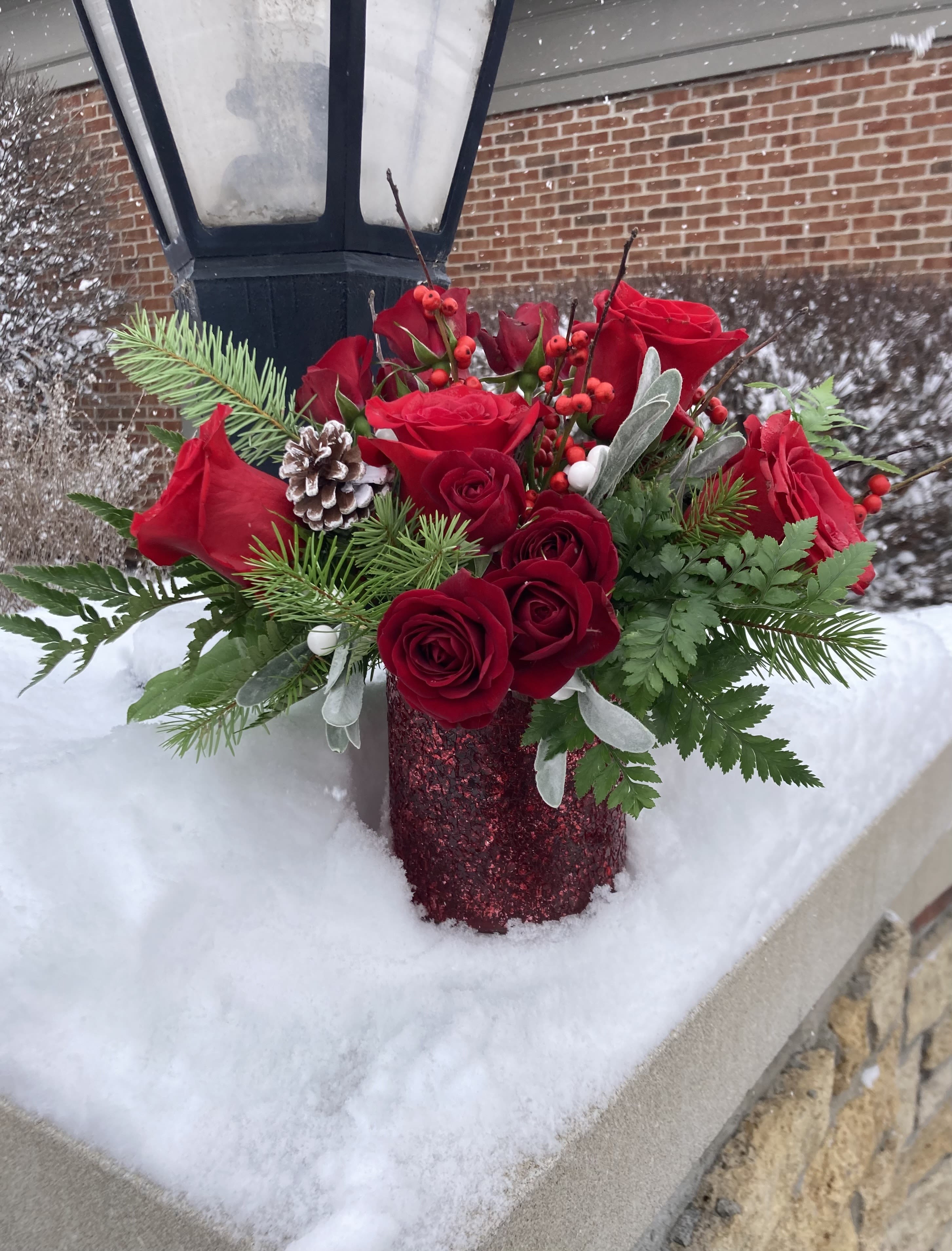 Cranberry Chutney - This radiant arrangement features red florals mixed with fragrant pine, and other specialty greens. This truly is the perfect gift to send out this holiday season. 
