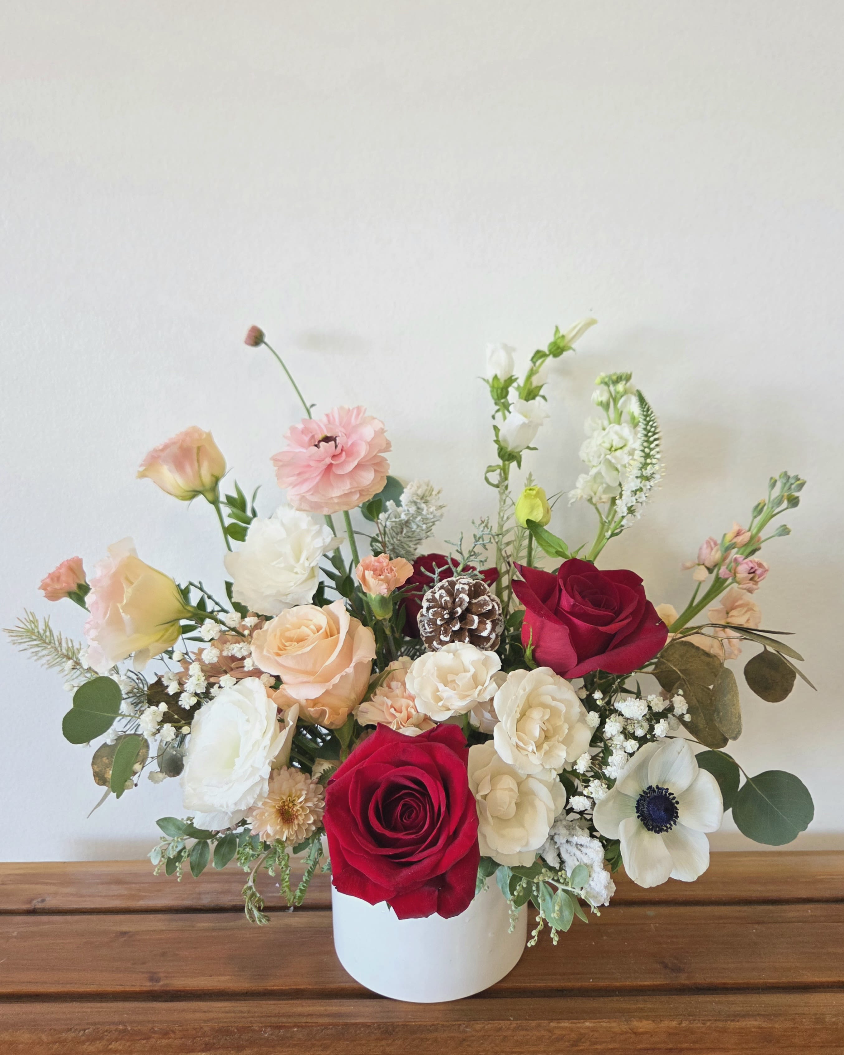 Holiday Harmony (New!) - Medium Size Vase Arrangement  *Store Hours: Mon~ Fri: 10:00 a.m. to 6:00 p.m. Sat: 9:00 a.m. to 4:00 p.m. Sun: Closed  *Delivery: Deliveries occur roughly between 9am - 5pm. We are unable to offer further specific delivery windows or guarantee delivery times. but we will always do our best to accommodate requests. If your delivery address has a gate code number, please provide it for smooth delivery.  *PICK UP: Pick up is available after 10am. If you need to pick up before 10am, please contact our shop to place your order directly. Text order: (714)715-1482  Please note that your arrangement may vary slightly from the picture depending on the season and store stock, but we will match color schemes and guarantee it will be fresh &amp; beautiful.  Thank you!