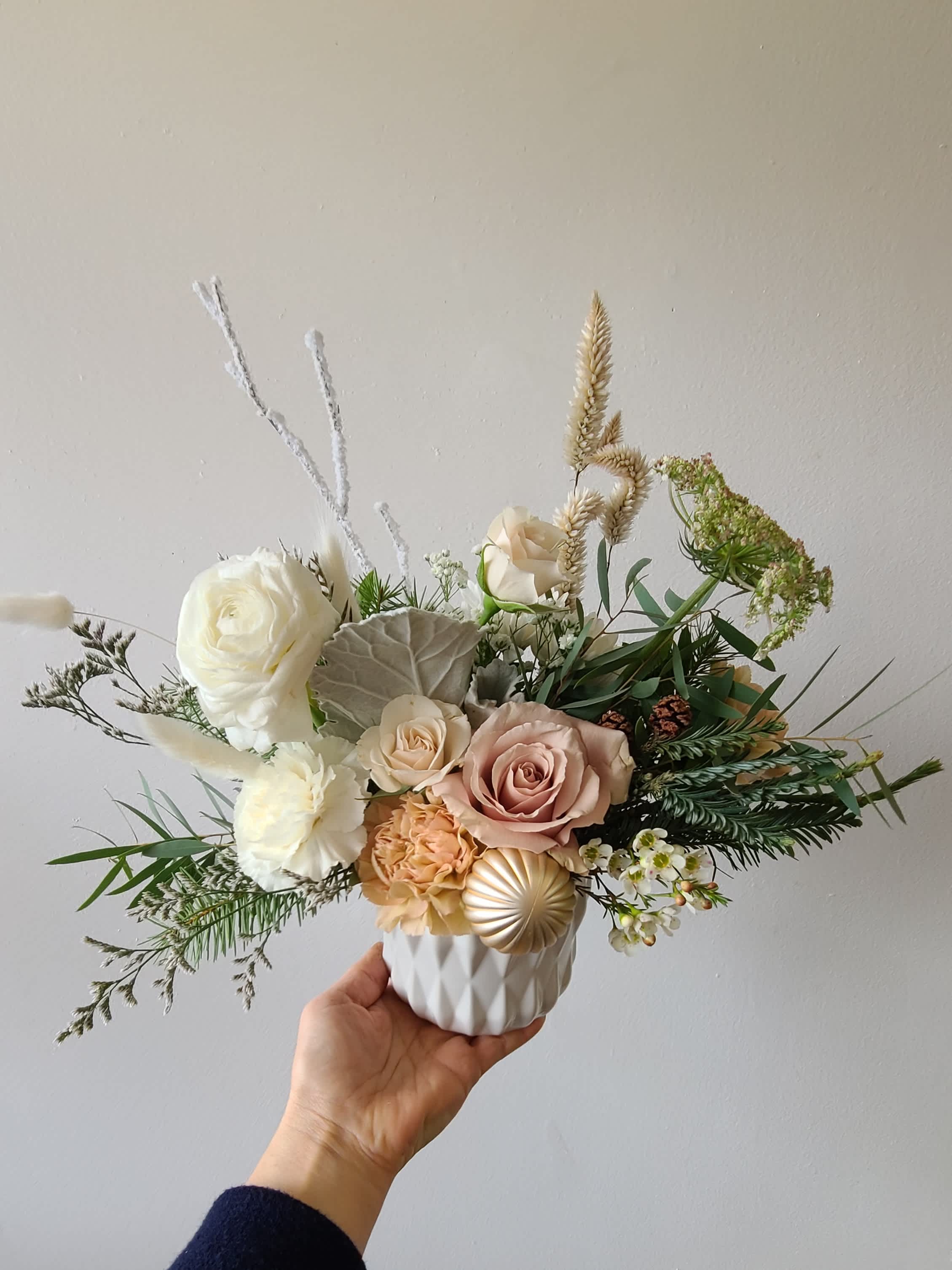 A Dream of Christmas (S) - Small Size Vase Arrangement  *Store Hours: Mon~ Fri: 10:00 a.m. to 6:00 p.m. Sat: 9:00 a.m. to 4:00 p.m. Sun: Closed  *Delivery: Deliveries occur roughly between 9am - 5pm. We are unable to offer further specific delivery windows or guarantee delivery times. but we will always do our best to accommodate requests. If your delivery address has a gate code number, please provide it for smooth delivery.  *PICK UP: Pick up is available after 10am. If you need to pick up before 10am, please contact our shop to place your order directly. Text order: (714)715-1482  Please note that your arrangement may vary slightly from the picture depending on the season and store stock, but we will match color schemes and guarantee it will be fresh &amp; beautiful.  Thank you!