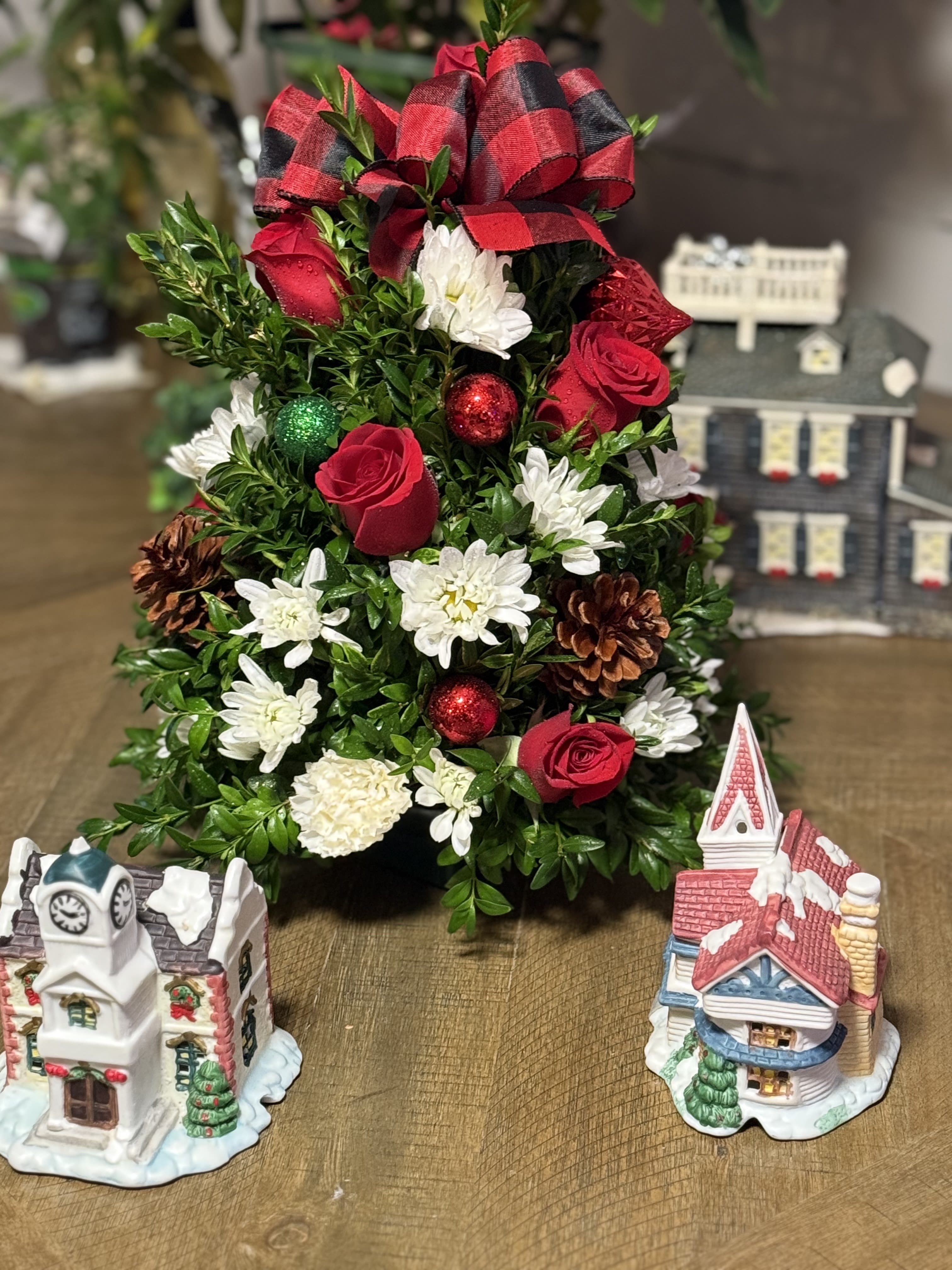Holiday tree - Box wood greens and red roses and white mums and ornaments 