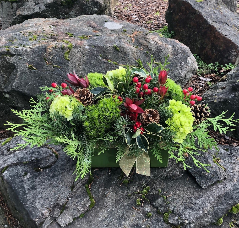 Northwestern Holiday  - Lavish and packed with christmas holiday cheer.  Lots of holiday greens and long lasting flowers that will be sure to last throughout the holiday.  
