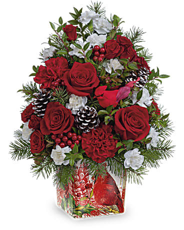 Teleflora's Cardinal In Flight Tree - Wondrous winter whimsy for any Christmas celebration! This charming floral "tree" is presented in a winter cardinal cube vase that lives on as a vintage-inspired votive holder.
