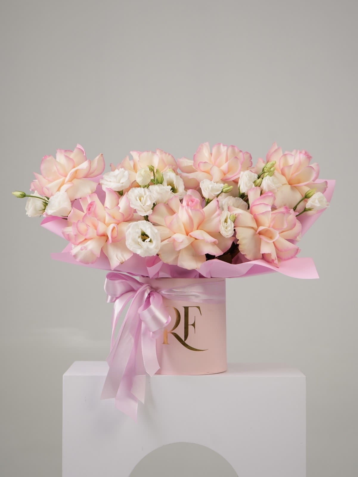 Mix Arrangement - French-styled roses and lisianthus arranged in a round box.