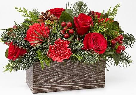 Winter Cabin Bouquet - Wood grain box (box may vary in style and color) with greens, pine cones, berries, red roses and red carnations.