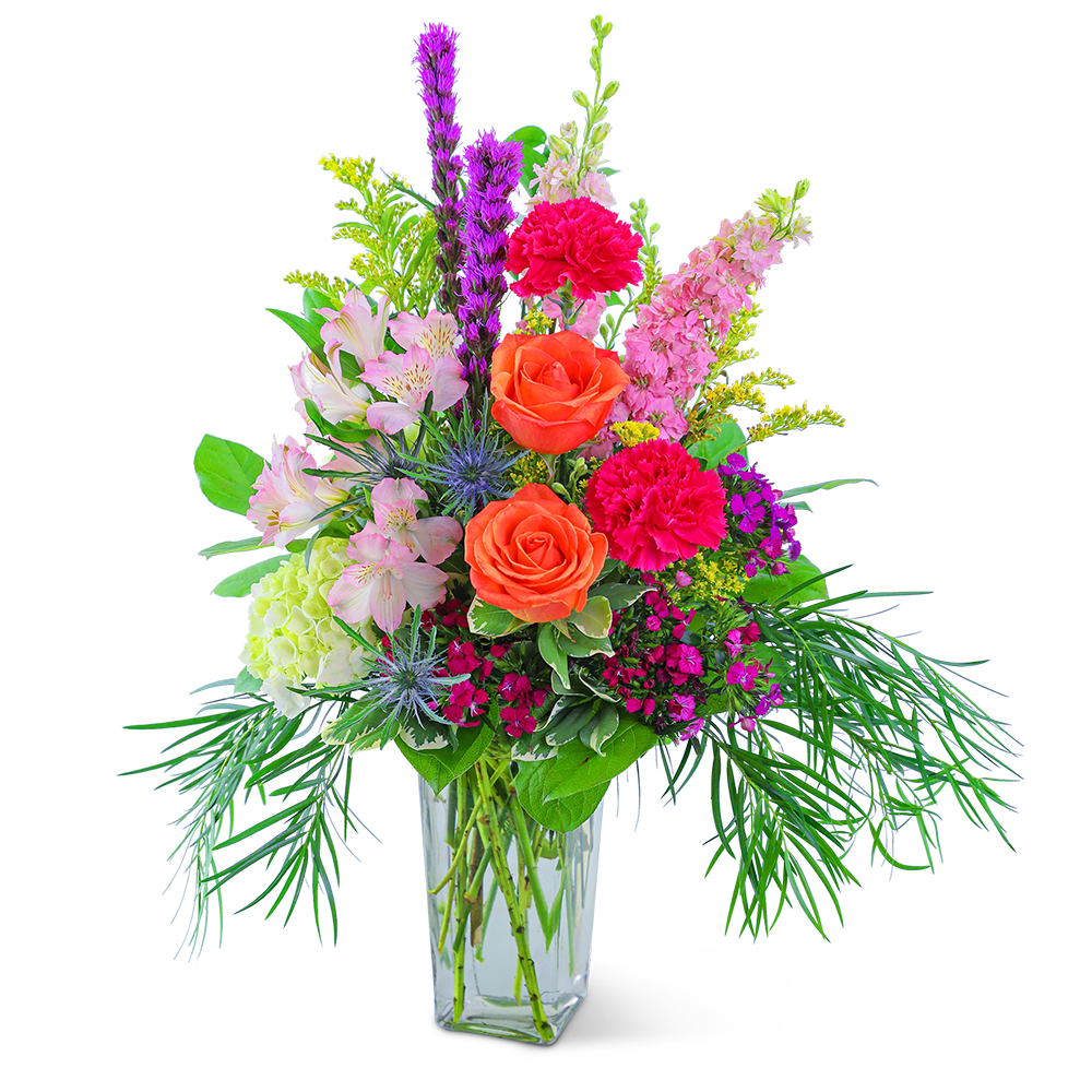 Take Me to St. Tropez - Get swept away to the South of France with this dazzling arrangement. A cascade of vibrant flowers, including Liatris, Larkspur, Roses, Carnations, Alstroemeria, Dianthus, and premium foliage come together to create a stunning arrangement. This would be the ideal gift to send for a birthday or to brighten up your own space.