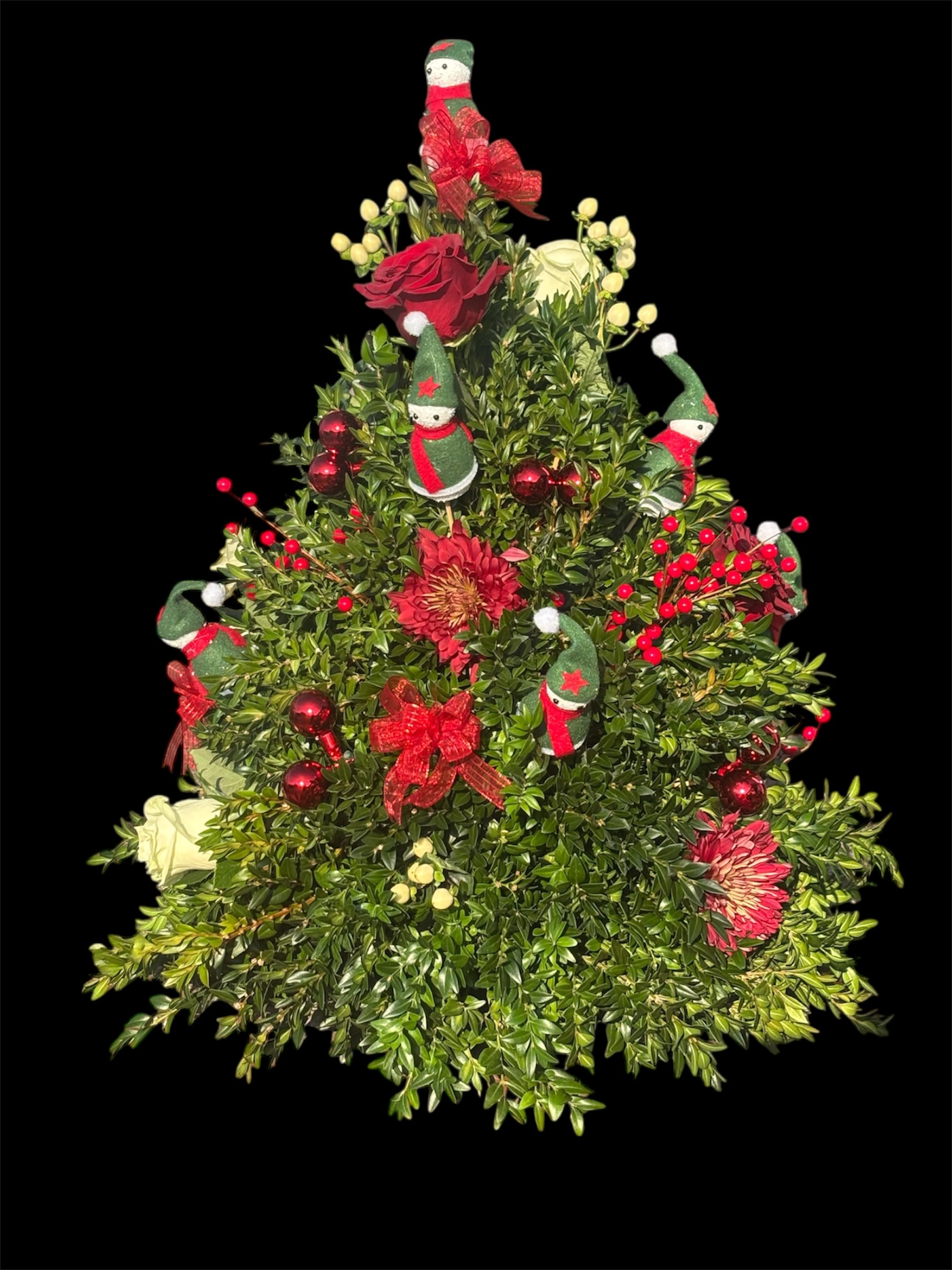 Mini christmas tree with snowmans - Mini Christmas tree centerpieces adorned with burgundy chrysanthemums, red and white roses, and festive berries. Decorated with Stick Deco snowmen, lush greenery, and sparkling ornaments, they bring holiday cheer to any table.