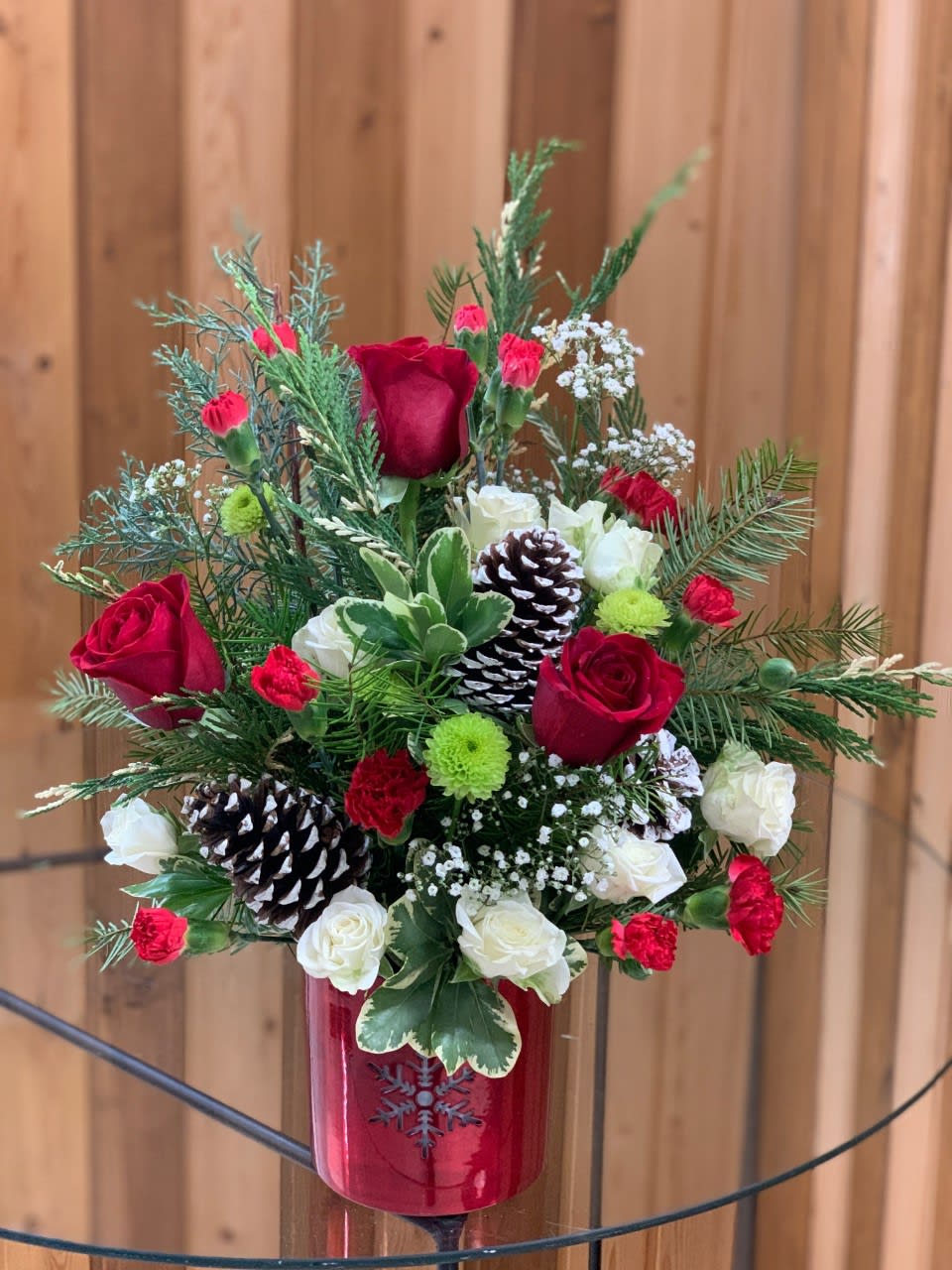 SNOWFLAKES IN THE AIR - This cute red tin container features a snowflake cut out and would make a cute candle holder for years to come! 