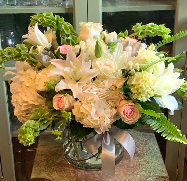 Here Comes The Bride - All white design featuring pops of blush to break up the flowing white. Perfect for a wedding day gift!