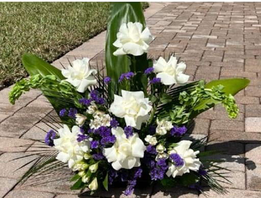 Prayers and Thoughts - A Mixture of White and Purple blooms to express elegant sympathy