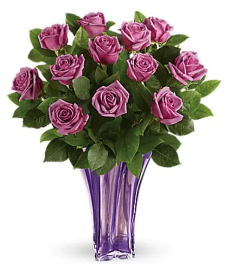 Lavender Splendor Bouquet - &quot;All you need is love - and roses! This simple yet stunning bouquet of luxe lavender long stemmed roses is hand-delivered in a blown glass vase for a truly impressive statement! Lush lavender roses are accented with fresh lemon leaf. Delivered in a  Lavender vase.   Orientation : All-Around  All prices in USD ($)  Standard  TEV50-1A  Deluxe  TEV50-1B  Premium  TEV50-1C&quot;