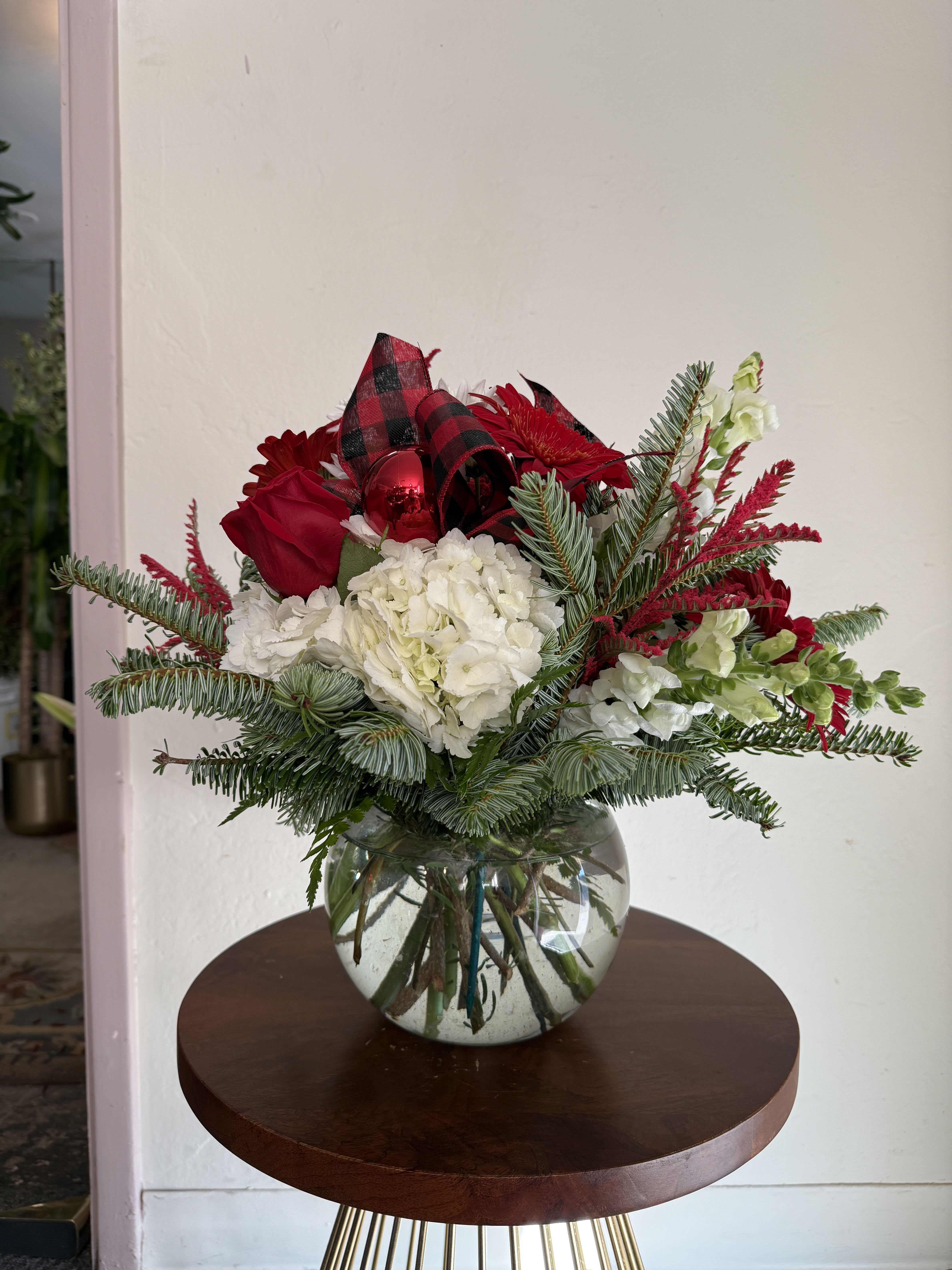 Bubble Bowl Christmas - A variety of red and white blooms, with christmas ribbon and ornaments. 