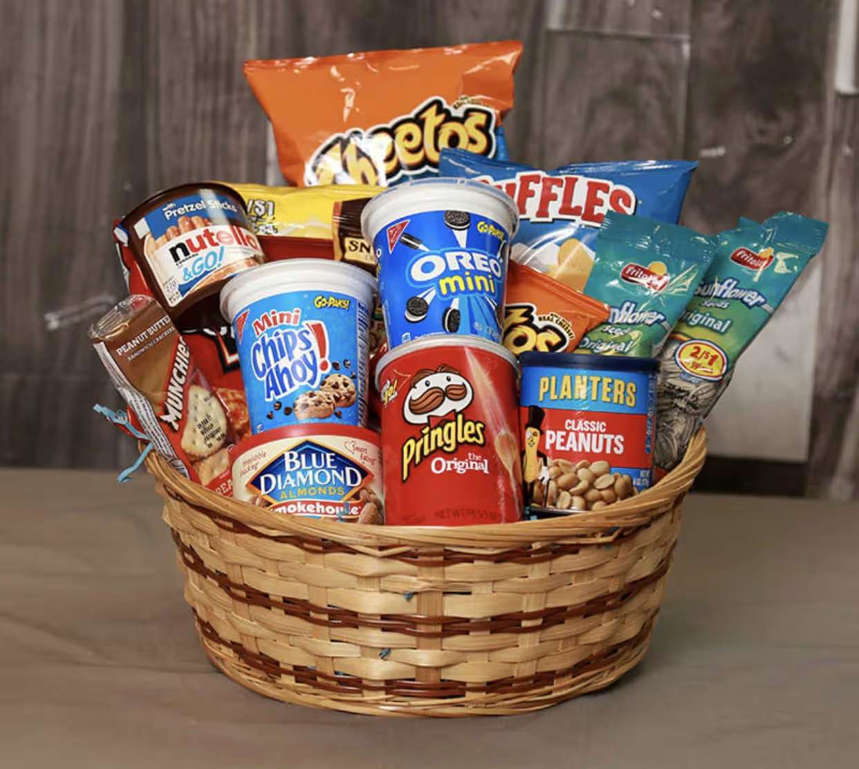 Snack Basket  - Customized basket with packaged snacks, assortment can be specific to the recipient.  pretzels, nuts, chips, cookies, chocolates, etc.