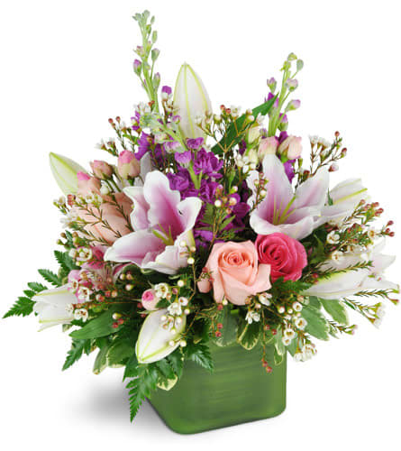 May Flowers - A lovely bouquet of soft, feminine flowers is perfect to send at any time of the year! That special someone will know how much you care, and be delighted to receive such a thoughtful and beautiful gift.   *** Please note that your blooms will reflect the overall style and tone of the pictured arrangement. Exact flower types, colors and vase style may vary and are based on availability.