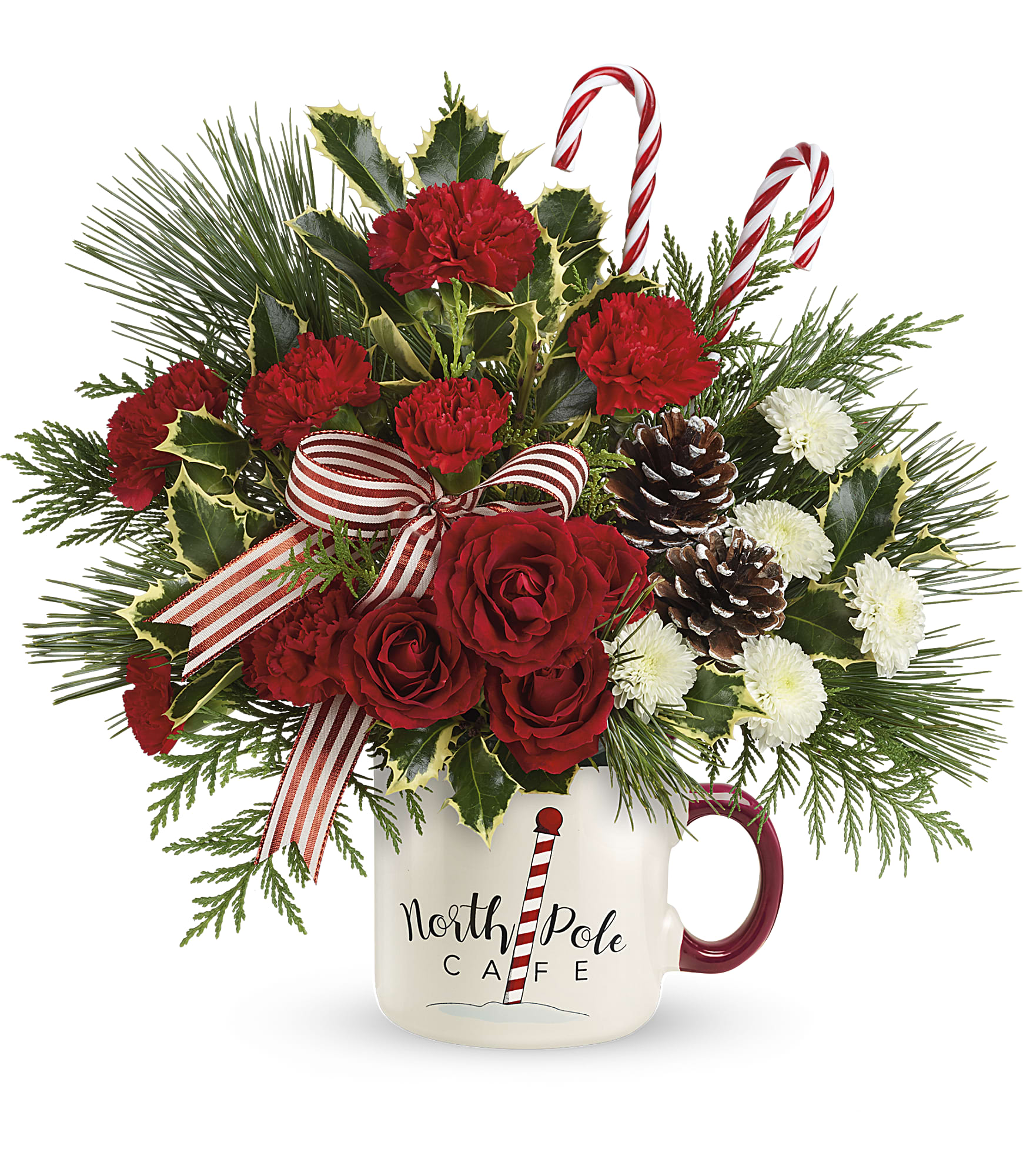 Send a Hug North Pole Cafe Mug by Teleflora  - Warm their hearts with this spirited holiday bouquet, arranged in a hand-painted, delightfully oversized mug from the North Pole Café! It's food safe for years of seasonal sipping delight.