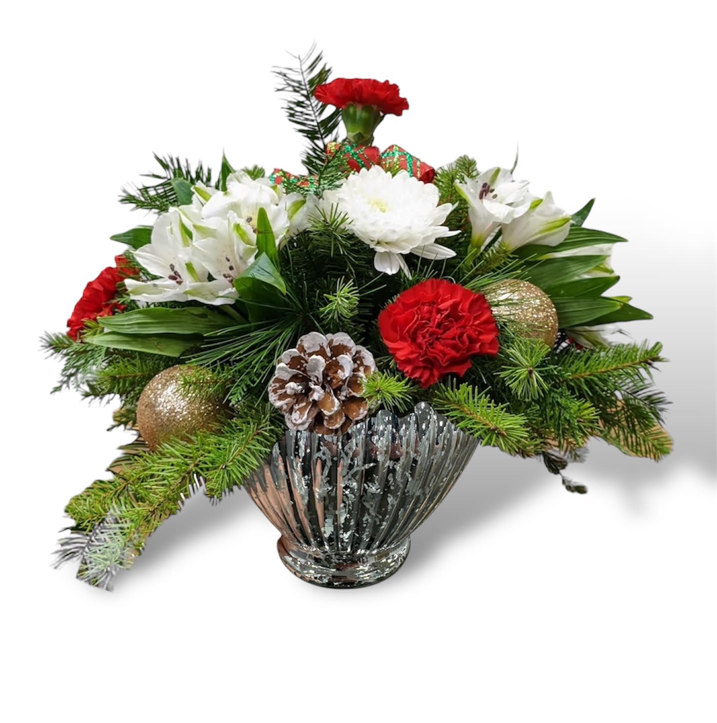 Home for Christmas - “A charming round arrangement in a shiny silver vase, featuring festive greenery, vibrant red and white blooms, and sparkling Christmas ornaments. Perfectly sized for your coffee table or a smaller round dining table, it’s an elegant touch for your holiday décor.”