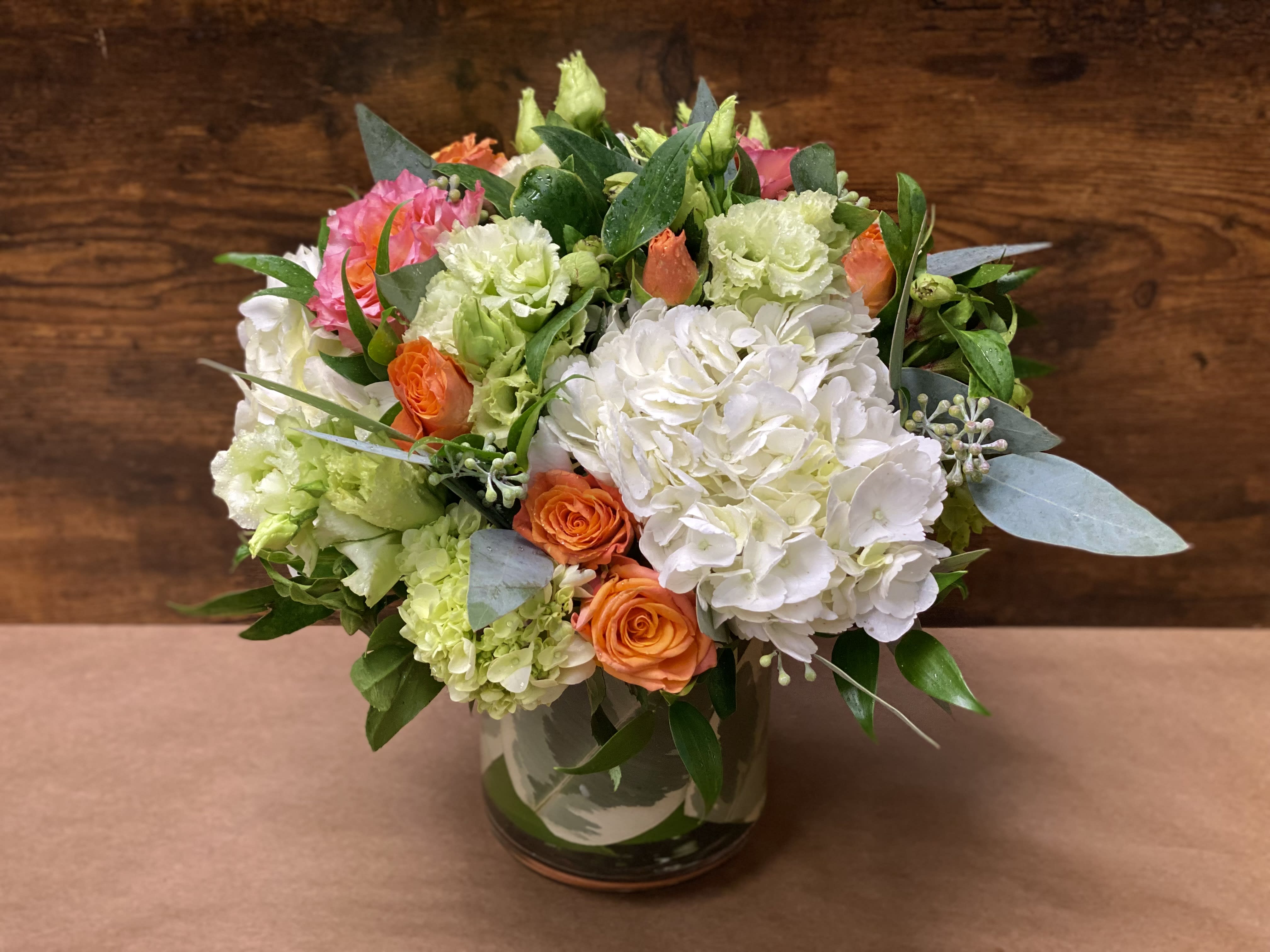 Generous - Hues of green florals with pops of white &amp; orange