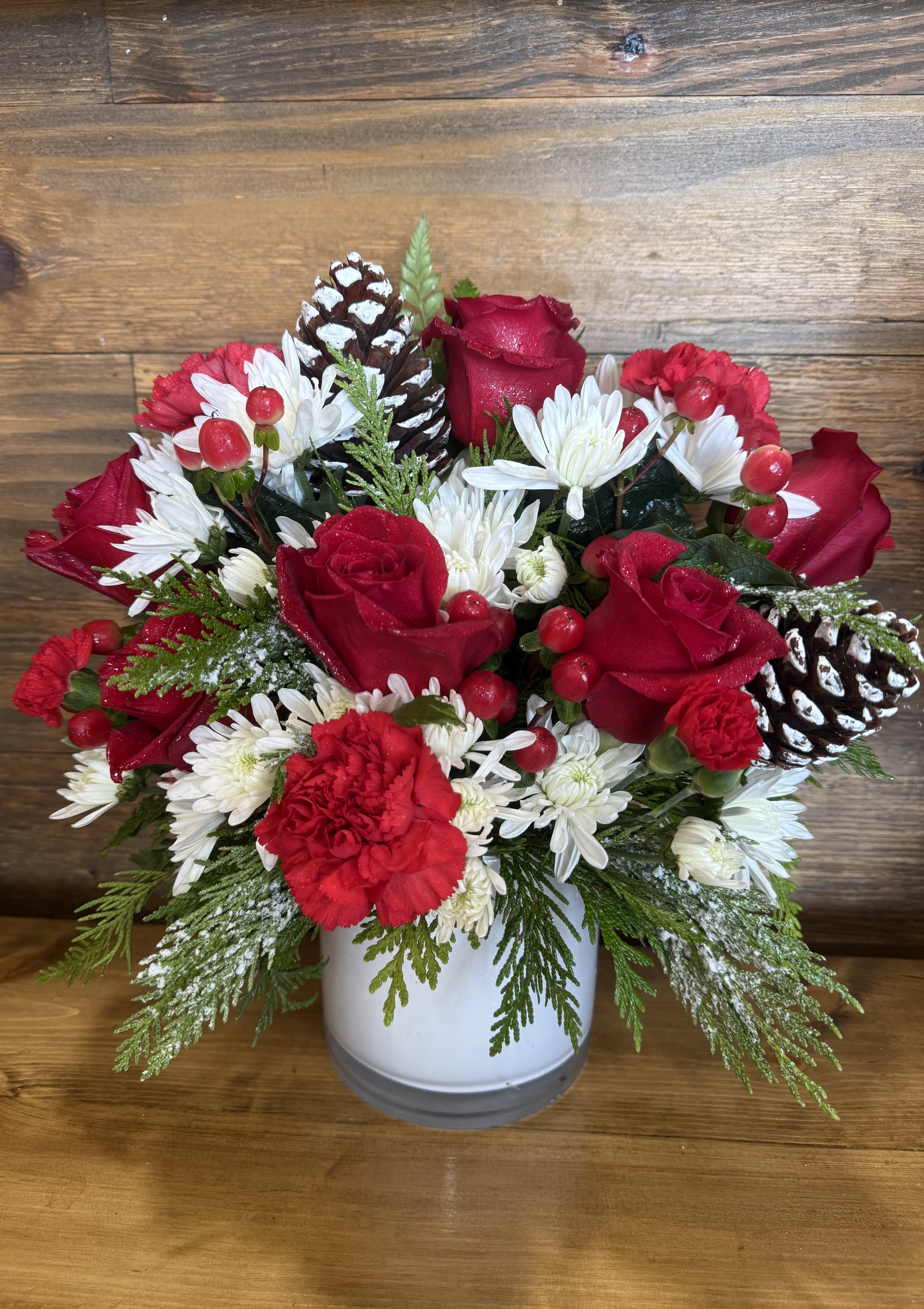 Frosty Love  - Love makes us warm inside, but sometimes that’s not what we want. Introducing Frosty Love. Send some seasonal love to a special someone with this arrangement. It’s not stoic, it’s frosty! 